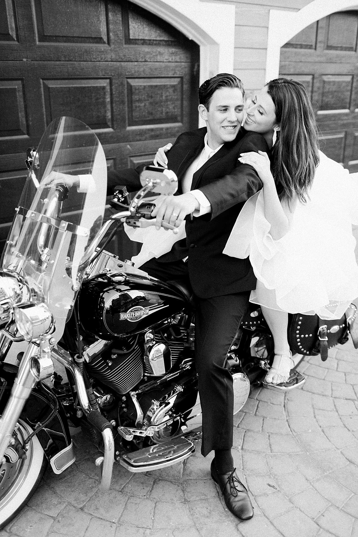 Arielle Peters Photography | Bride and groom on motorcycle on wedding day at Loft 310 in Kalamazoo, Michigan.