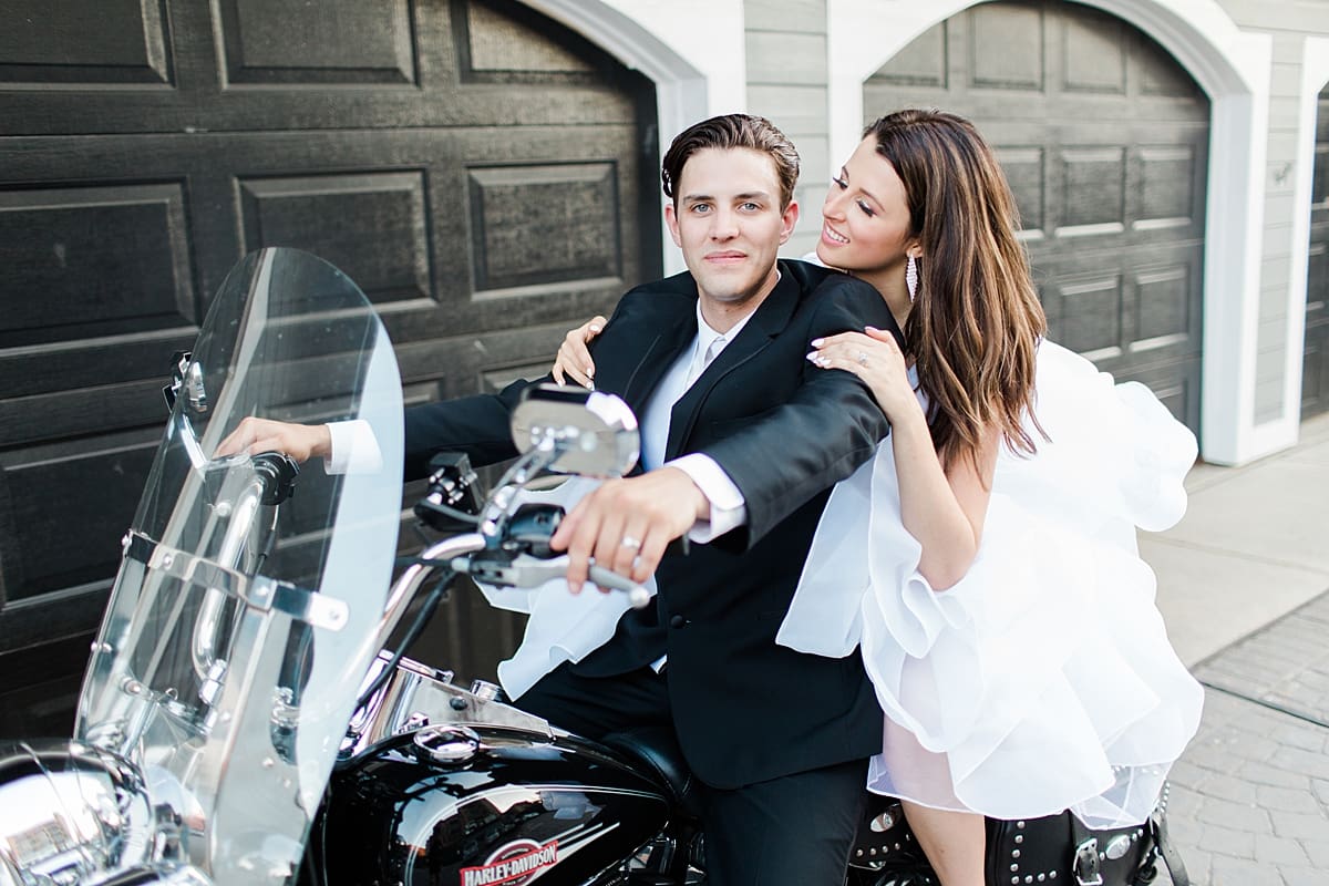 Arielle Peters Photography | Bride and groom on motorcycle on wedding day at Loft 310 in Kalamazoo, Michigan.