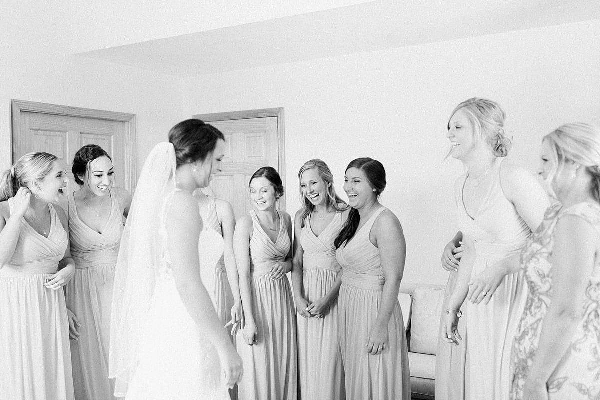 Arielle Peters Photography | Bride and bridesmaids having first reveal on wedding day at St. Joe Farm in Granger, Indiana.