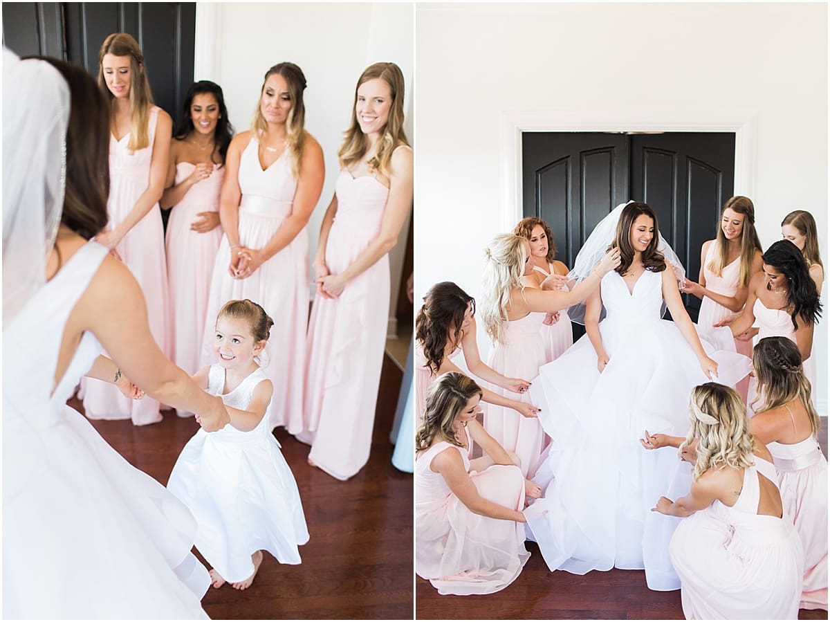 Arielle Peters Photography | Bride and bridesmaids having first reveal on wedding day at Loft 310 in Kalamazoo, Michigan.