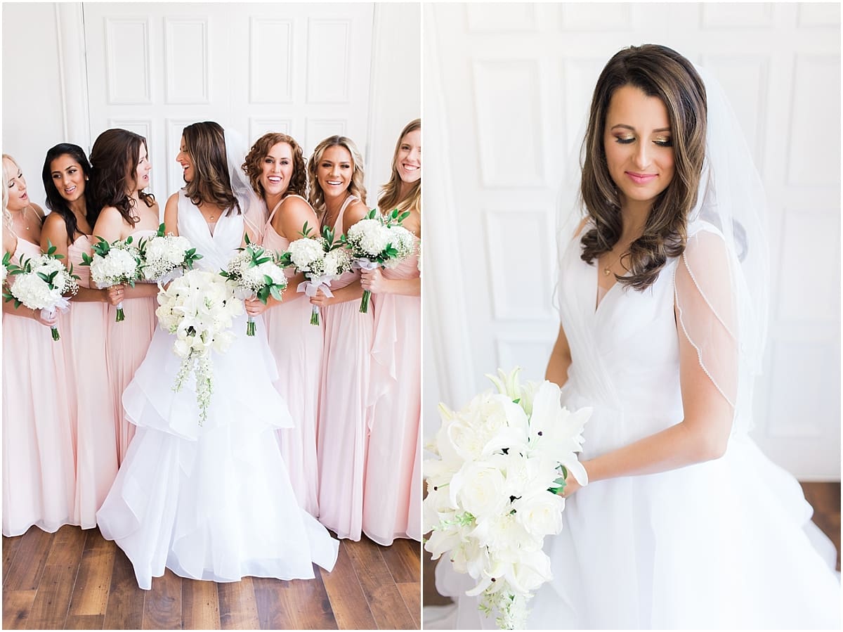 Arielle Peters Photography | Bride and bridesmaids with bouquets on wedding day at Loft 310 in Kalamazoo, Michigan.