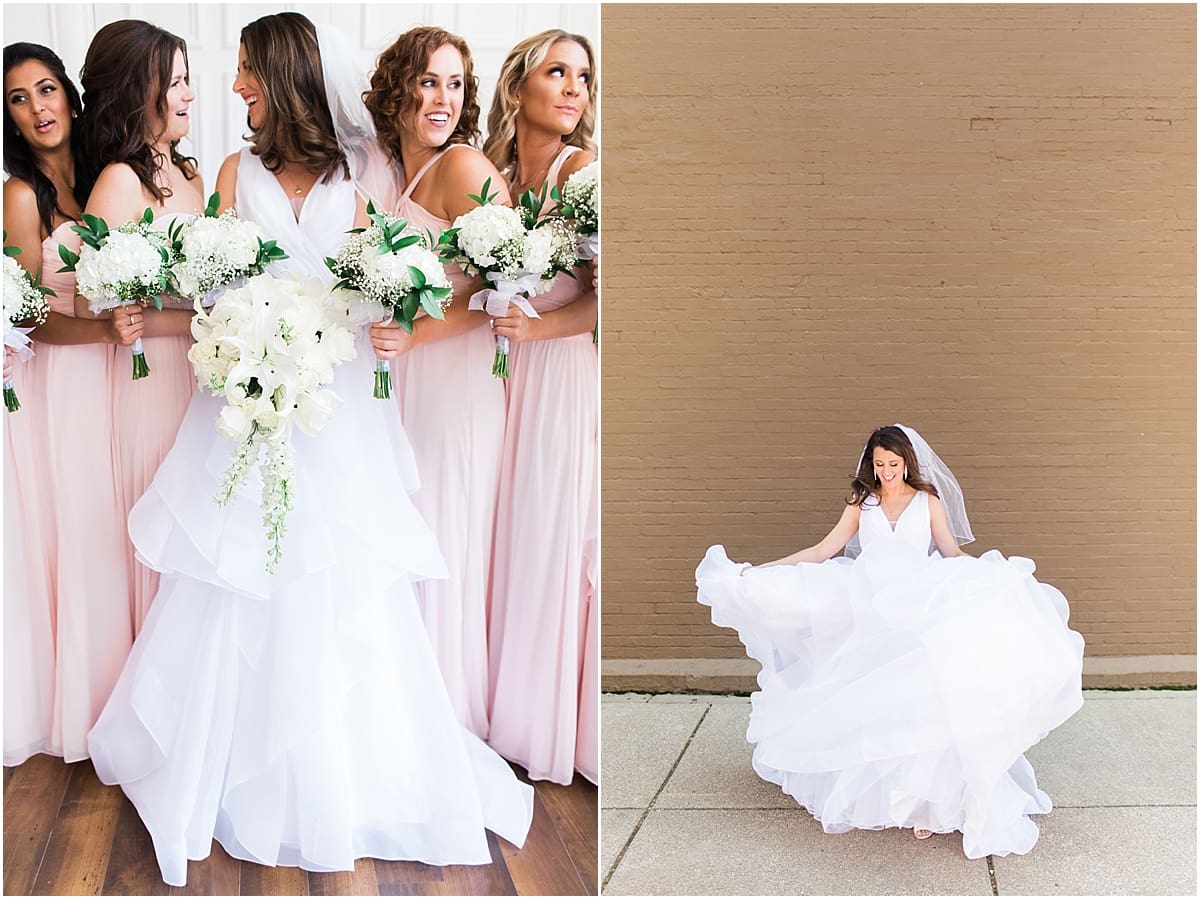 Arielle Peters Photography | Bride and bridesmaids with bouquets on wedding day at Loft 310 in Kalamazoo, Michigan.