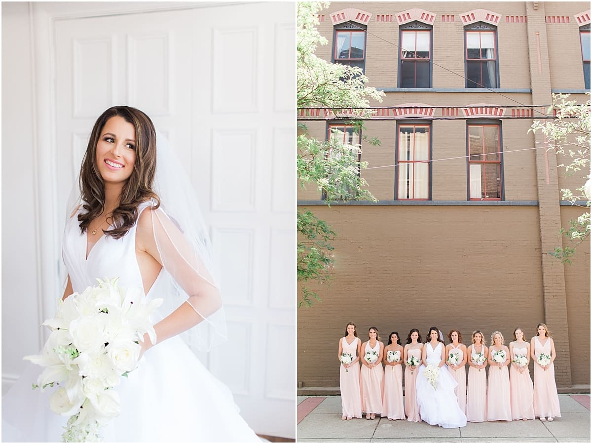 Arielle Peters Photography | Bride and bridesmaids with bouquets on wedding day at Loft 310 in Kalamazoo, Michigan.