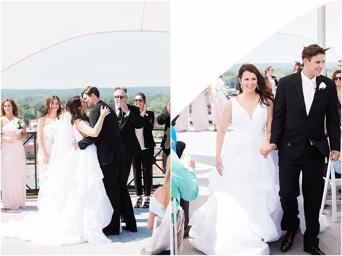 Arielle Peters Photography | Bride and groom walking down aisle on wedding day at Loft 310 in Kalamazoo, Michigan.