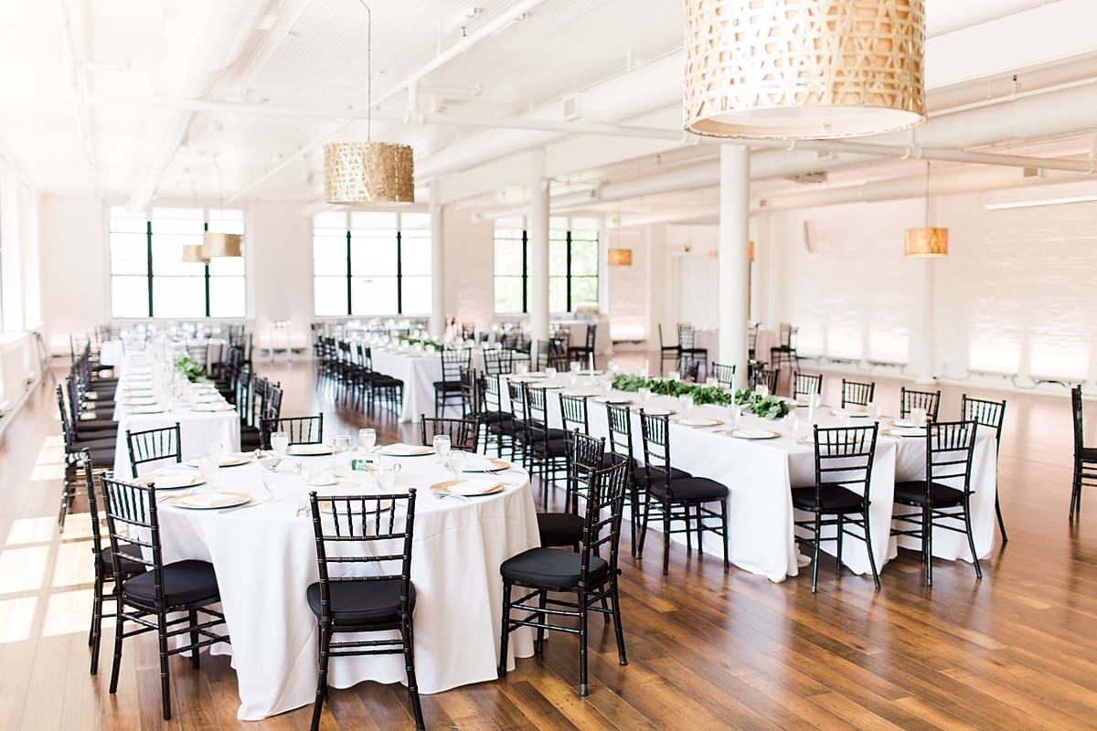 Arielle Peters Photography | Wedding reception table settings and floral arrangements wedding day at Loft 310 in Kalamazoo, Michigan.