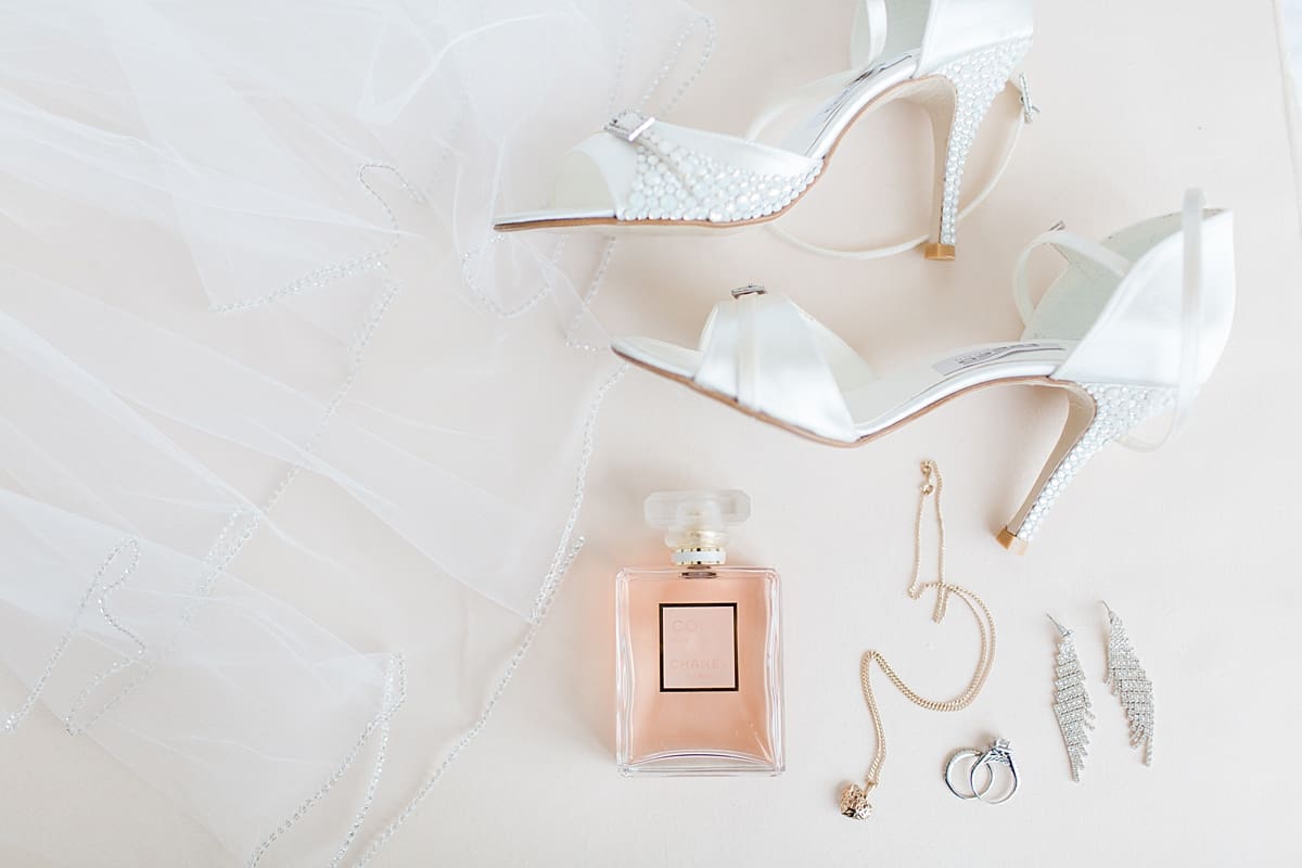 Arielle Peters Photography | Wedding shoes and perfume on wedding day at Loft 310 in Kalamazoo, Michigan.