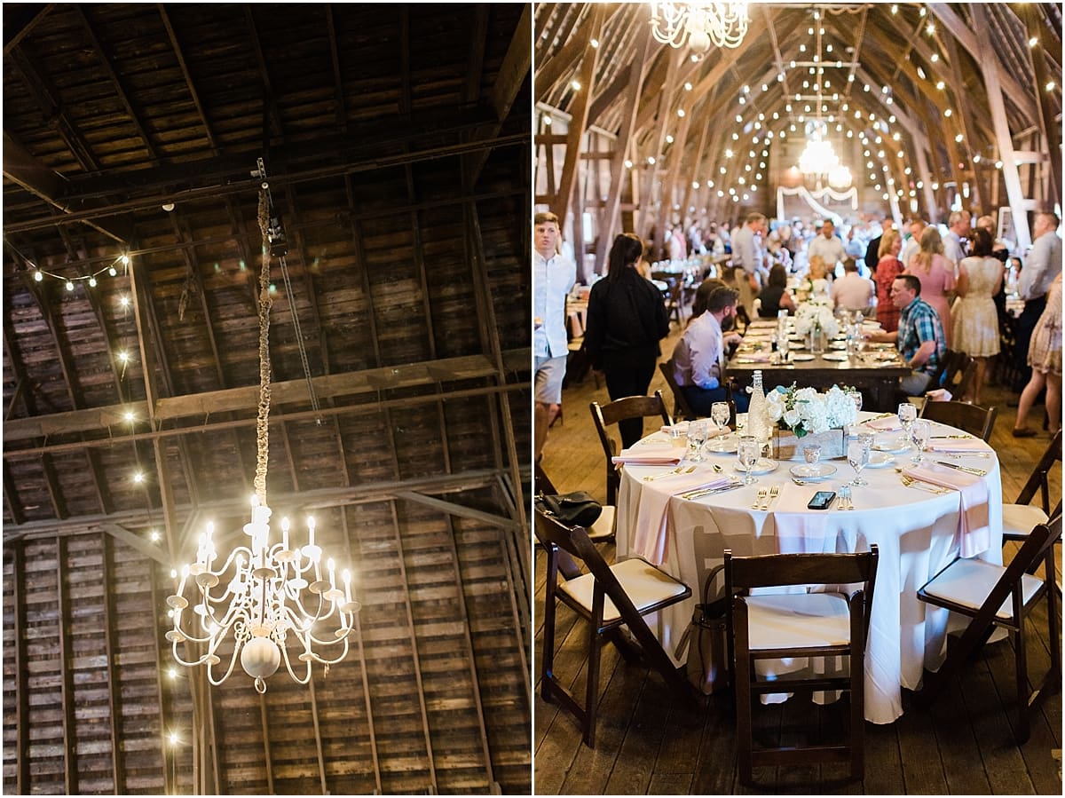 Arielle Peters Photography | Wedding reception table settings and floral arrangements inside historic barn on wedding day at St. Joe Farm in Granger, Indiana.