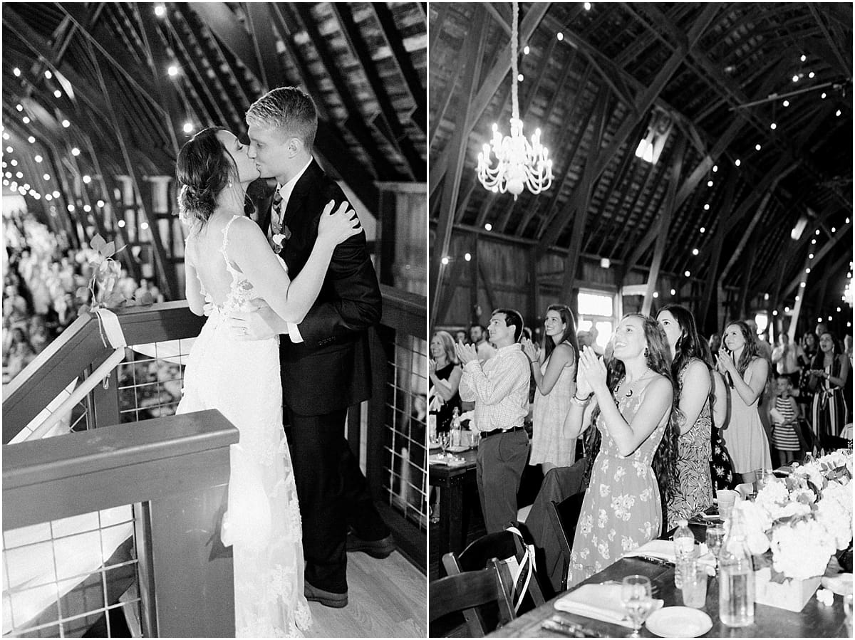 Arielle Peters Photography | Bride and groom entering wedding reception inside historic barn on wedding day at St. Joe Farm in Granger, Indiana.