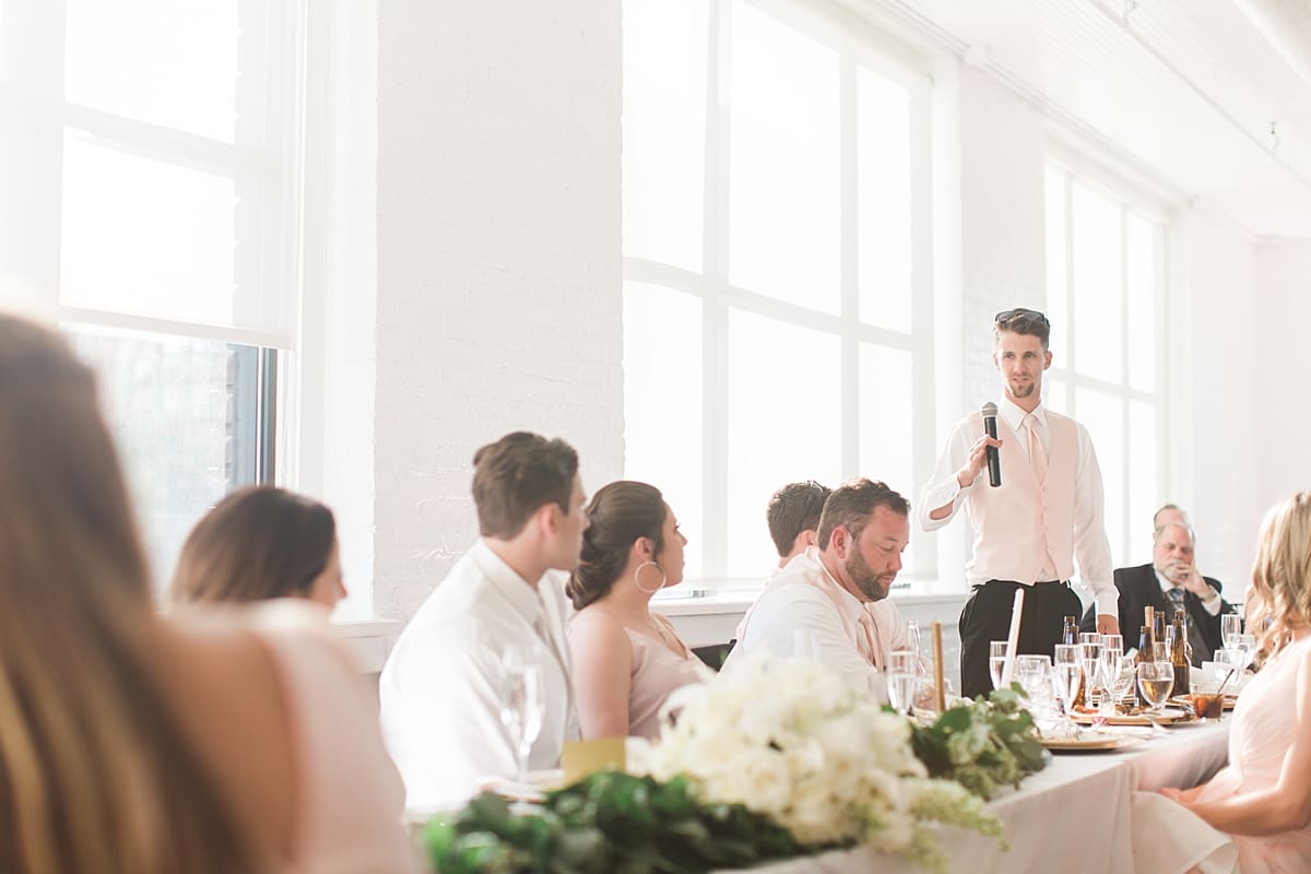 Arielle Peters Photography | Best man giving a speech at wedding reception on wedding day at Loft 310 in Kalamazoo, Michigan.