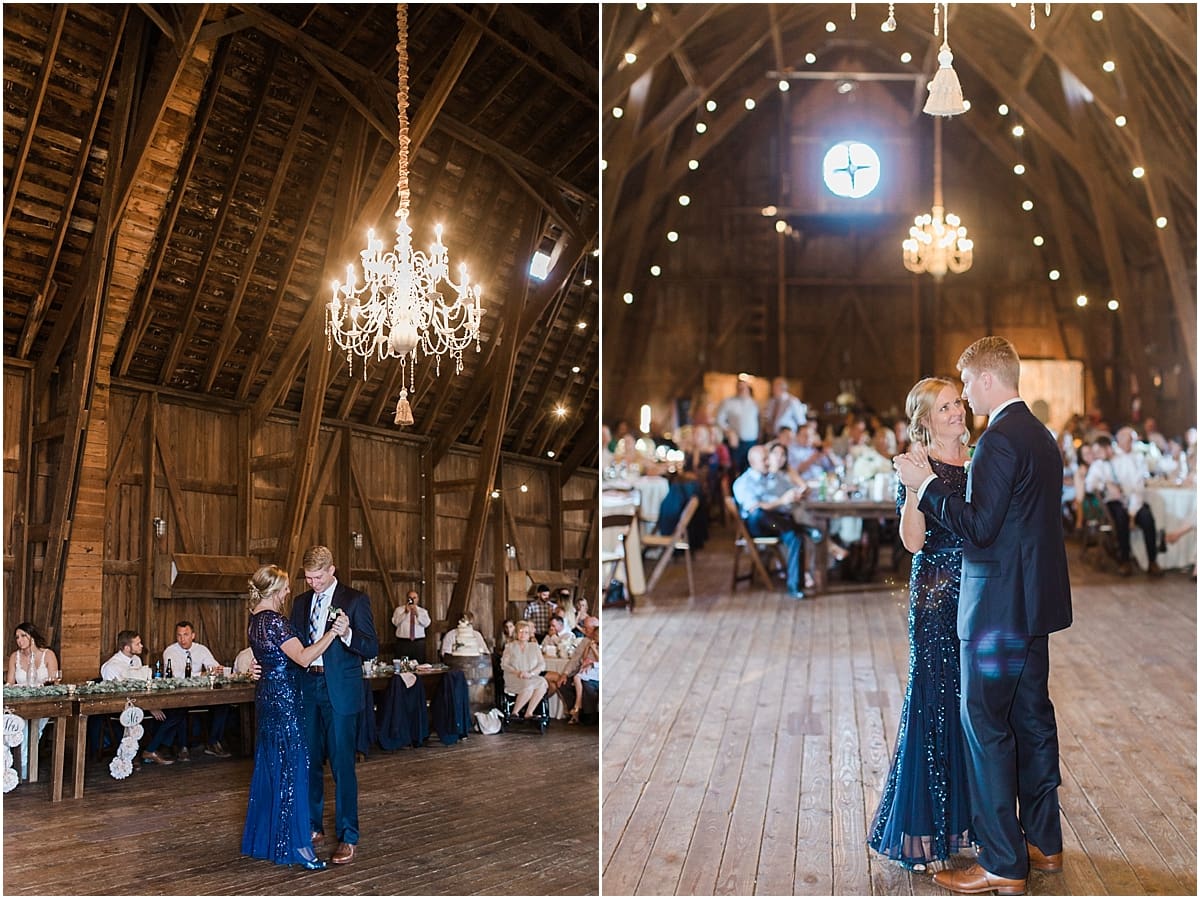Arielle Peters Photography | Mother of the groom and groom sharing a dance inside historic barn on wedding day at St. Joe Farm in Granger, Indiana.
