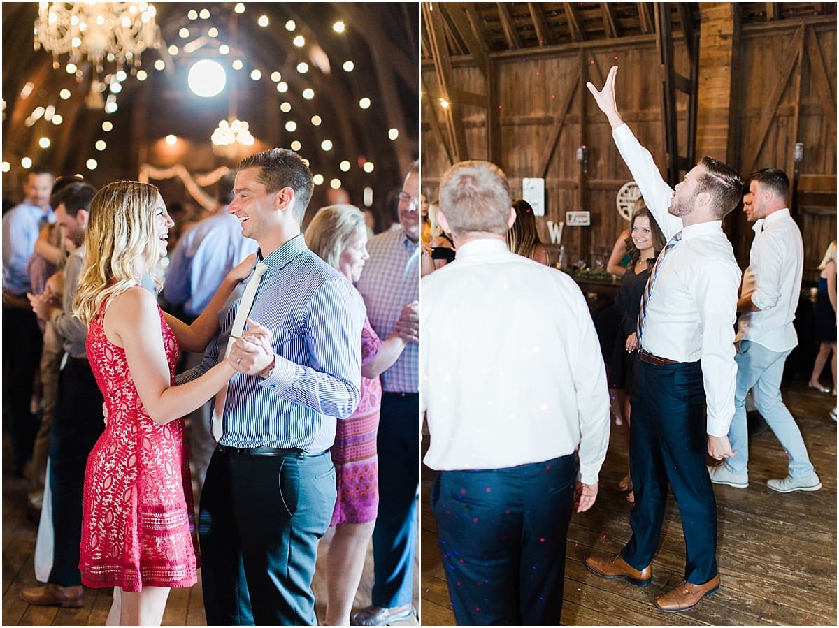 Arielle Peters Photography | Wedding guests dancing inside historic barn on wedding day at St. Joe Farm in Granger, Indiana.
