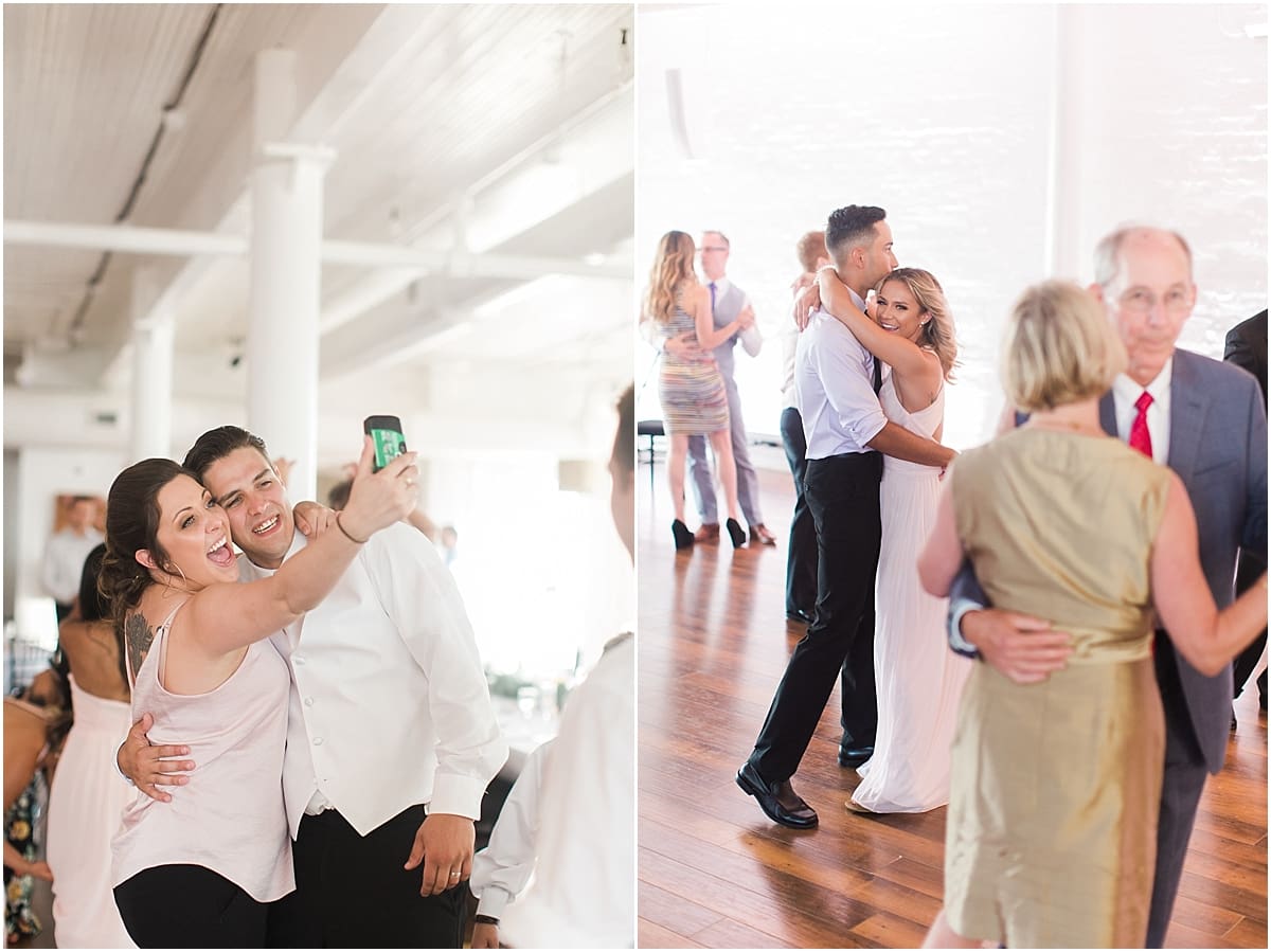 Arielle Peters Photography | Groom taking a selfie at wedding reception on wedding day at Loft 310 in Kalamazoo, Michigan.