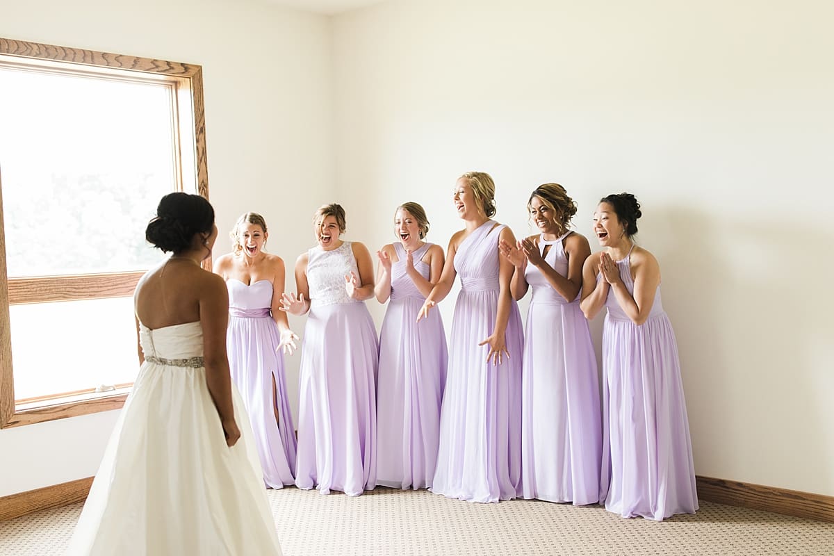 Arielle Peters Photography | Bridesmaids getting first reveal of bride on wedding day in Fort Wayne, Indiana. 