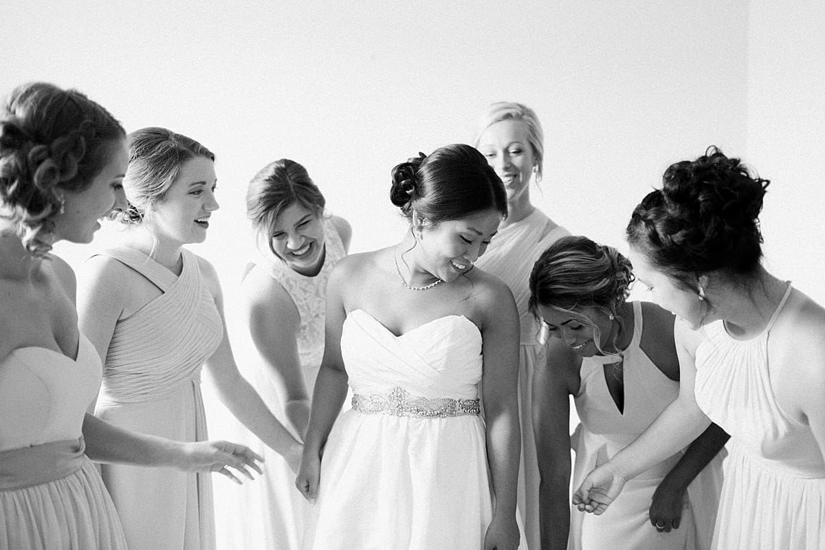 Arielle Peters Photography | Bridesmaids getting first reveal of bride on wedding day in Fort Wayne, Indiana. 