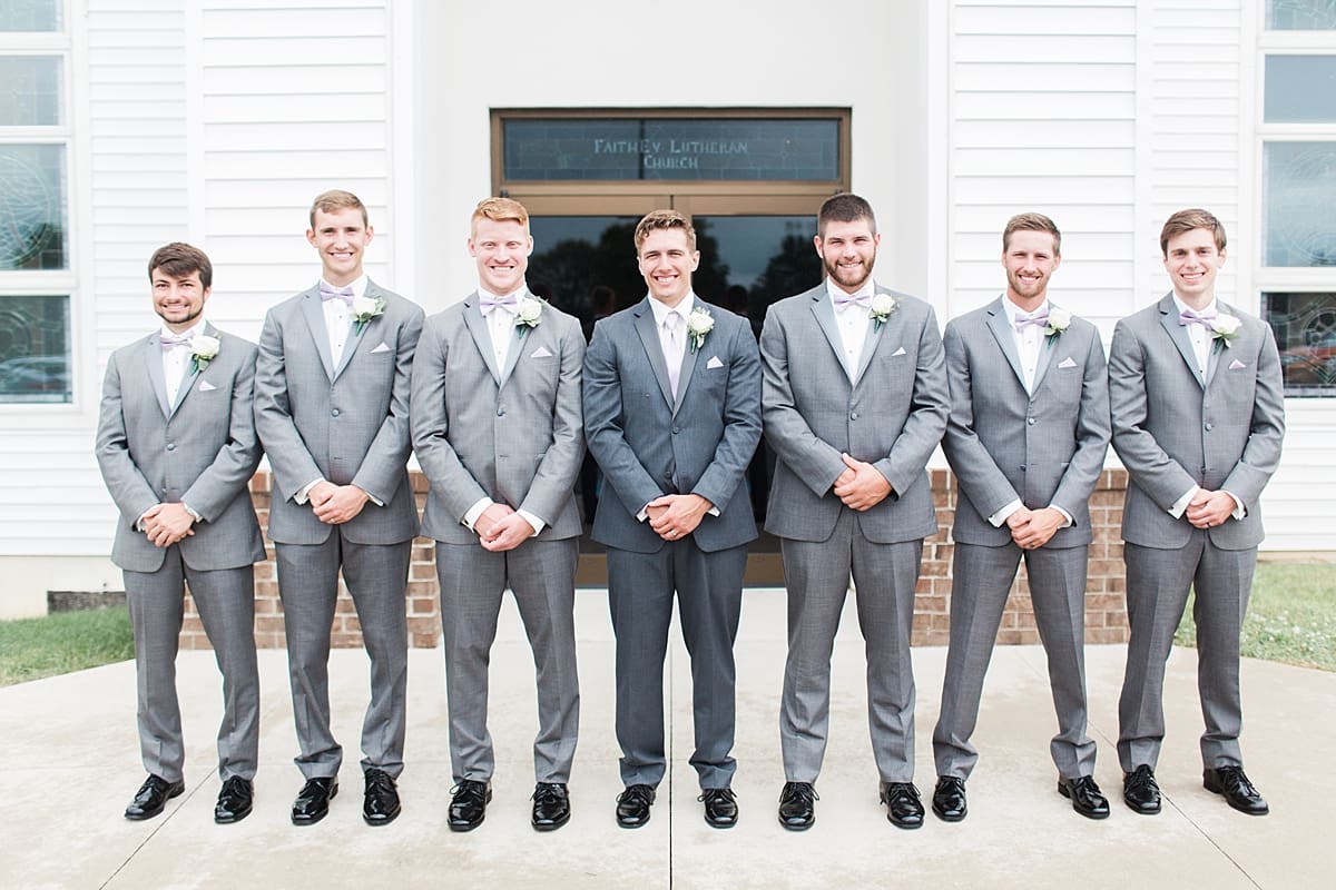Arielle Peters Photography | Groom and groomsmen outside church on wedding day in Fort Wayne, Indiana. 