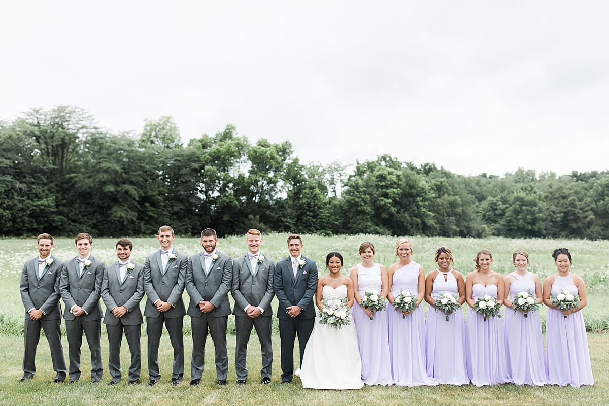 Arielle Peters Photography | Wedding party in open field on wedding day in Fort Wayne, Indiana. 