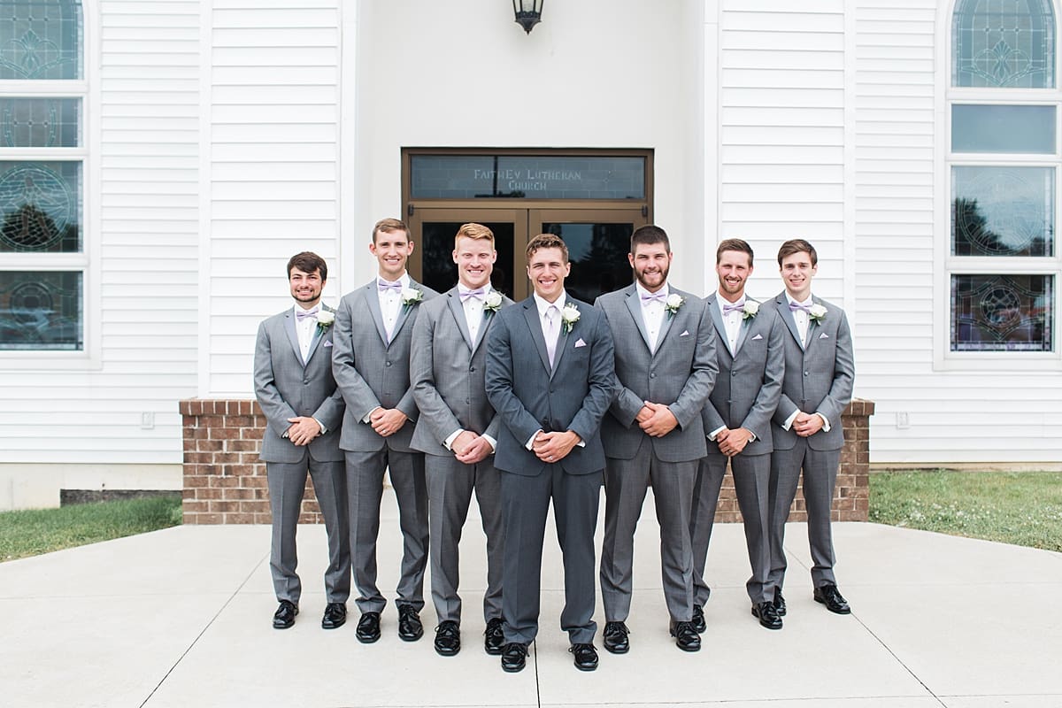 Arielle Peters Photography | Groom and groomsmen outside church on wedding day in Fort Wayne, Indiana. 