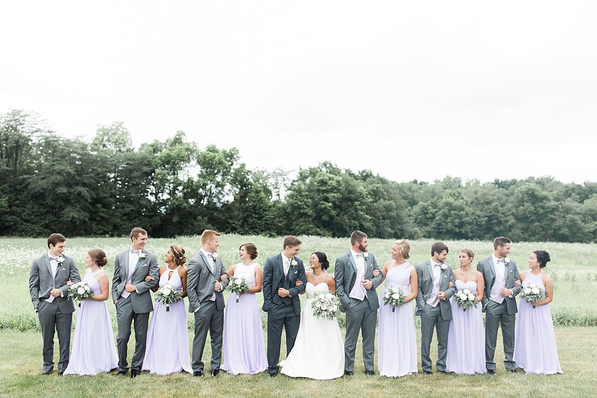 Arielle Peters Photography | Wedding party in open field on wedding day in Fort Wayne, Indiana. 