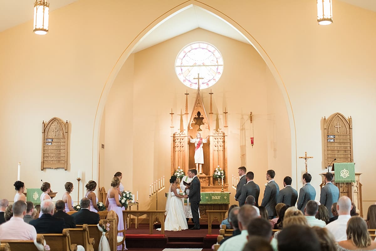 Arielle Peters Photography | Bride and groom standing at the alter on wedding day in Fort Wayne, Indiana. 