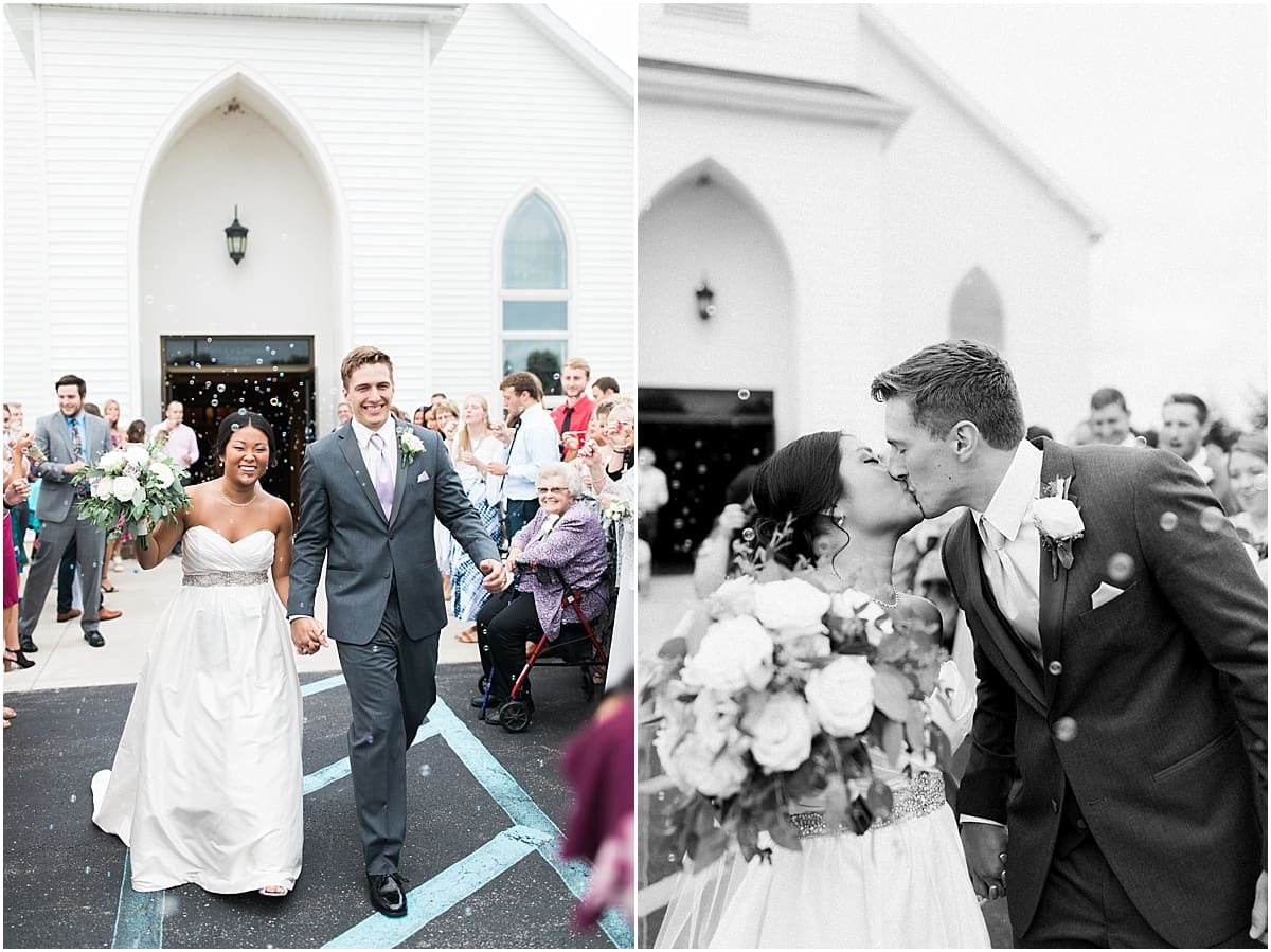 Arielle Peters Photography | Bride and groom walking out of the church on wedding day in Fort Wayne, Indiana. 