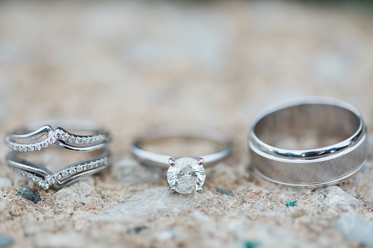 Arielle Peters Photography | Wedding rings lined up at The Inn at Harbor Springs in St. Joseph, Michigan.