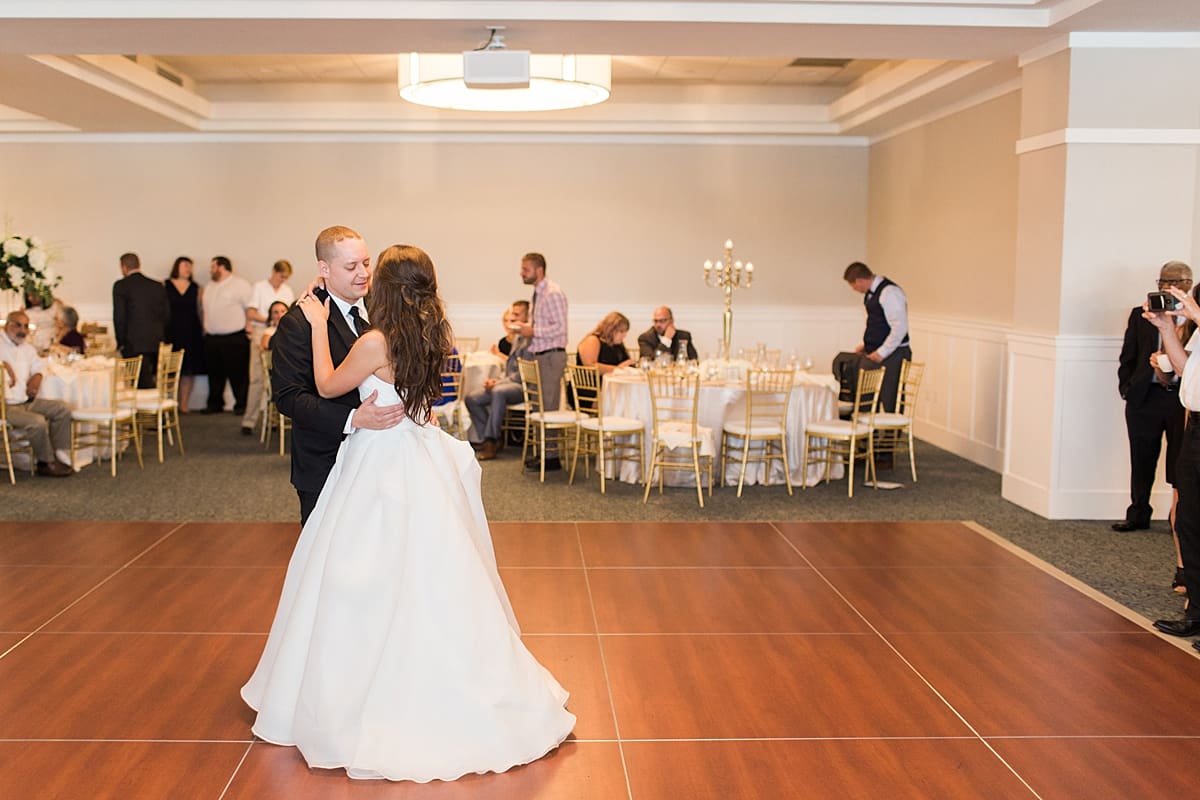 Arielle Peters Photography | Bride and groom sharing first dance at wedding reception at The Inn at Harbor Springs in St. Joseph, Michigan.