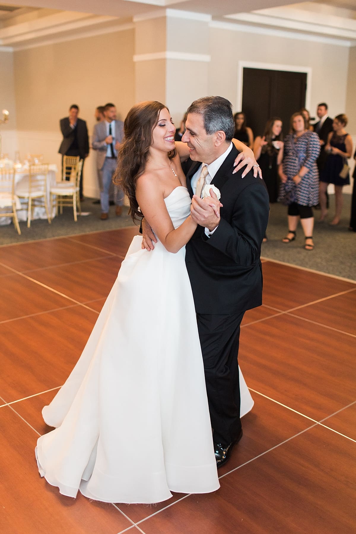 Arielle Peters Photography | Father of the bride and bride sharing a dance at wedding reception at The Inn at Harbor Springs in St. Joseph, Michigan.