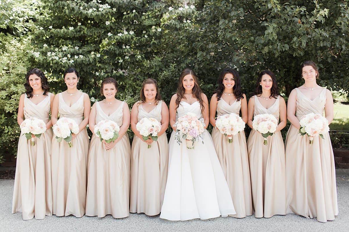 Arielle Peters Photography | Bride and bridesmaids outside on summer wedding day at The Inn at Harbor Springs in St. Joseph, Michigan.