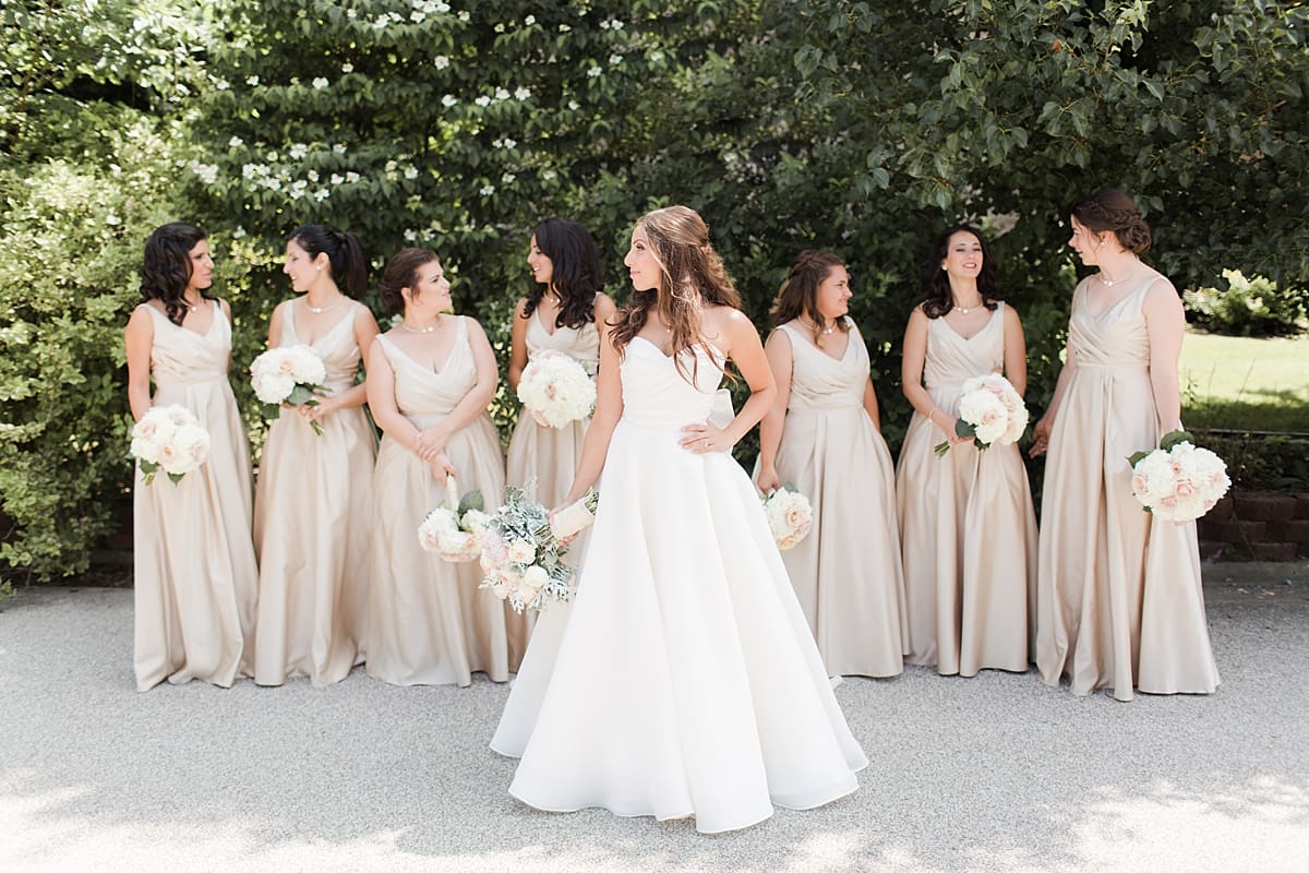 Arielle Peters Photography | Bride and bridesmaids outside on summer wedding day at The Inn at Harbor Springs in St. Joseph, Michigan.