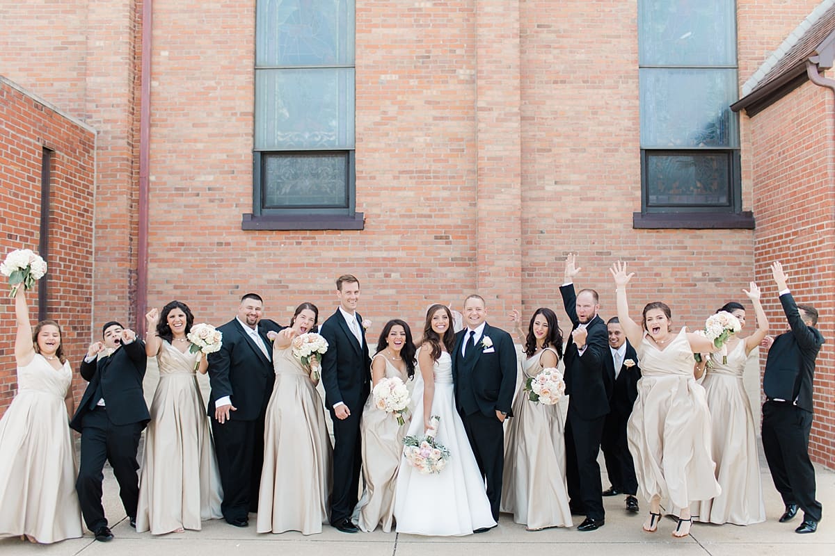 Arielle Peters Photography | Wedding party outside of church on summer wedding day at The Inn at Harbor Springs in St. Joseph, Michigan.