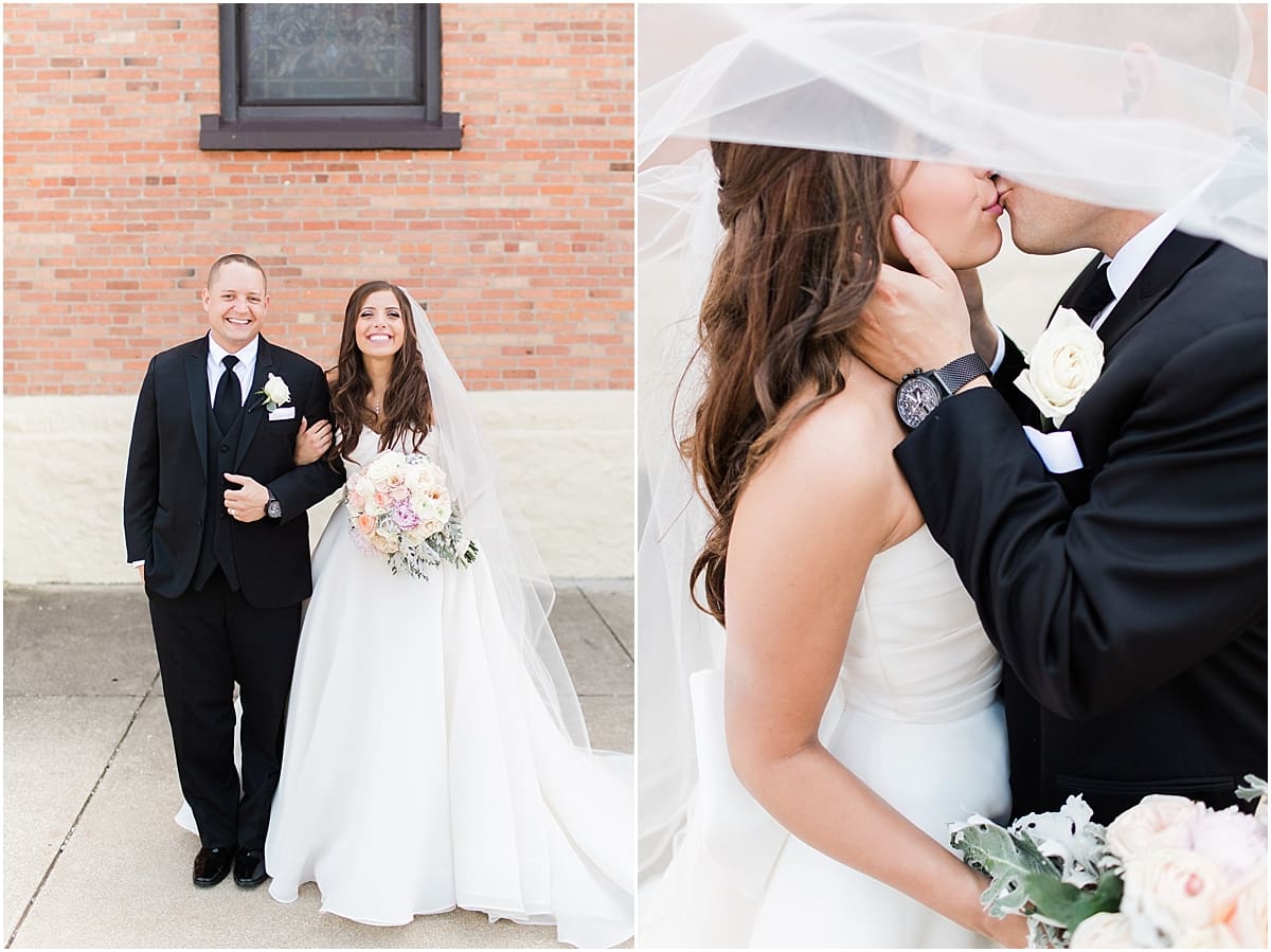 Arielle Peters Photography | Bride and groom kissing under veil on summer wedding day at The Inn at Harbor Springs in St. Joseph, Michigan.