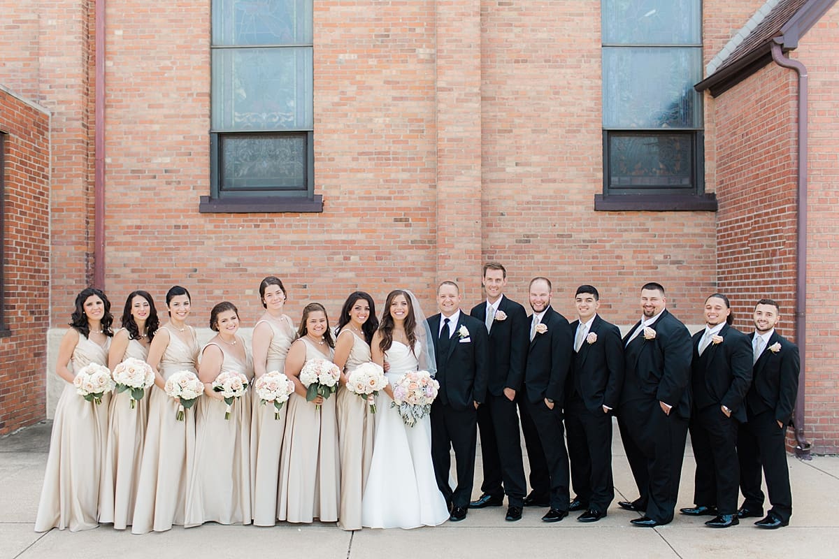 Arielle Peters Photography | Wedding party outside of church on summer wedding day at The Inn at Harbor Springs in St. Joseph, Michigan.