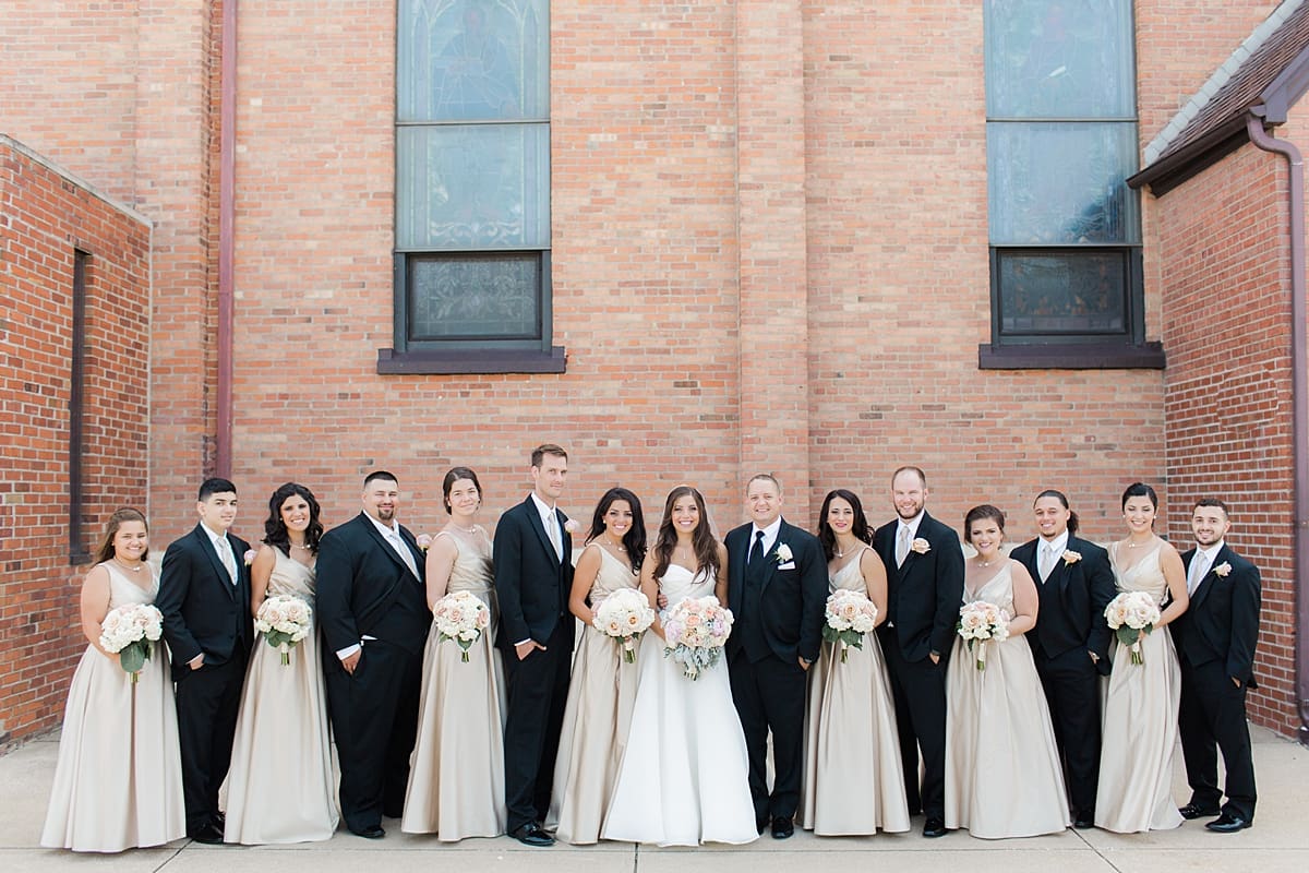Arielle Peters Photography | Wedding party outside on summer wedding day at The Inn at Harbor Springs in St. Joseph, Michigan.