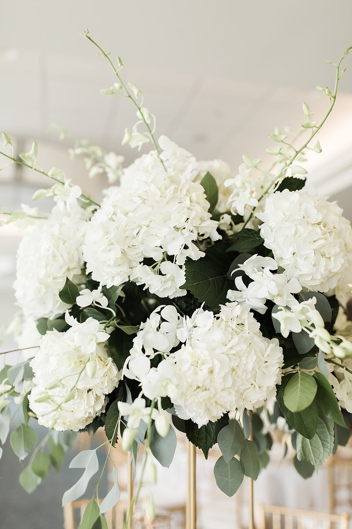 Arielle Peters Photography | Wedding reception table settings and floral arrangements at The Inn at Harbor Springs in St. Joseph, Michigan.