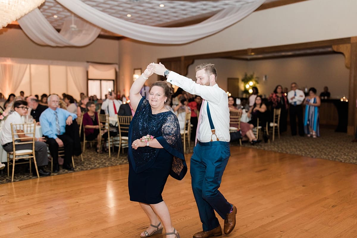Arielle Peters Photography | Mother of the groom and groom sharing a dance at wedding reception at the Banquets at The Croatian Center in Merrillville, Indiana.