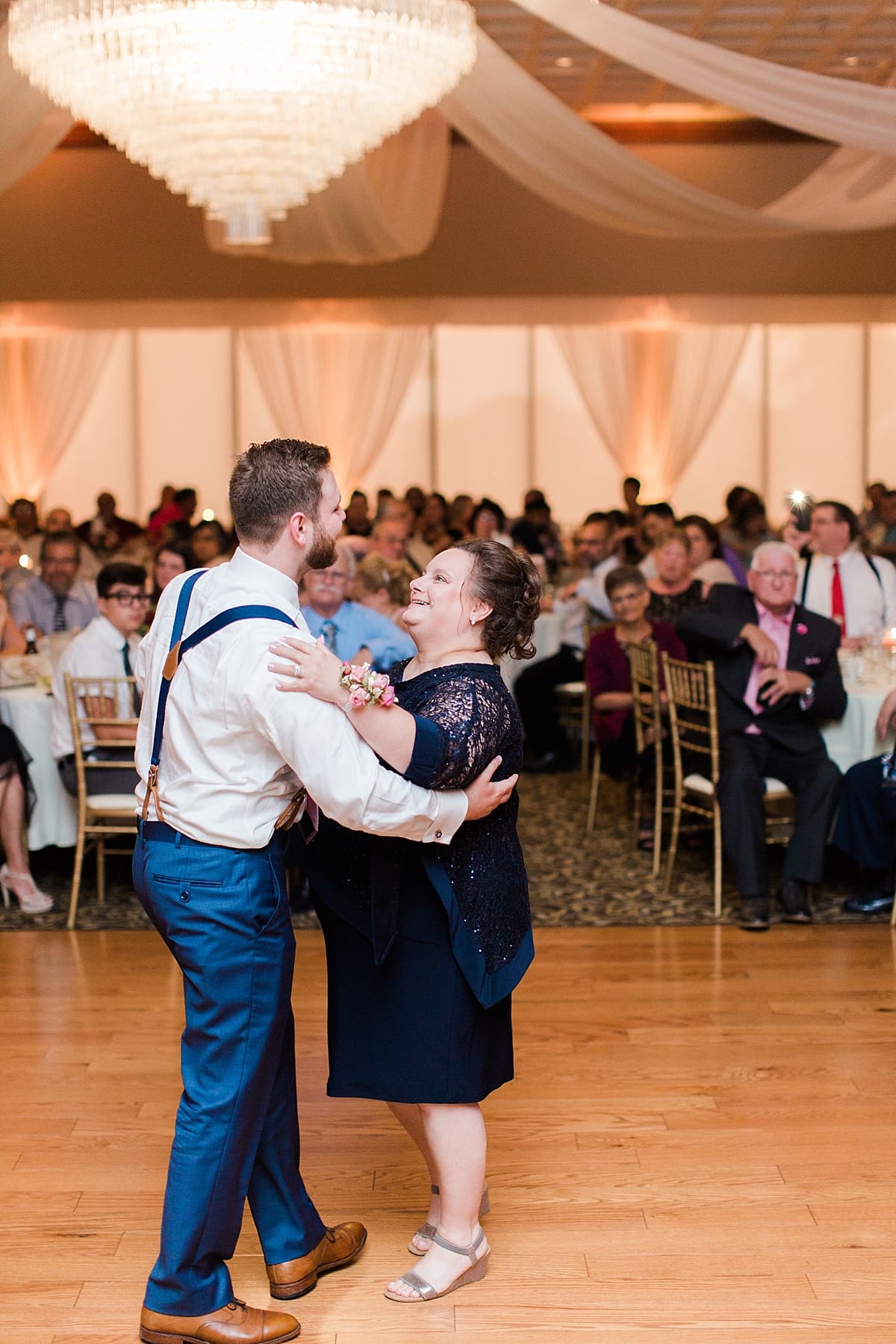 Arielle Peters Photography | Mother of the groom and groom sharing a dance at wedding reception at the Banquets at The Croatian Center in Merrillville, Indiana.