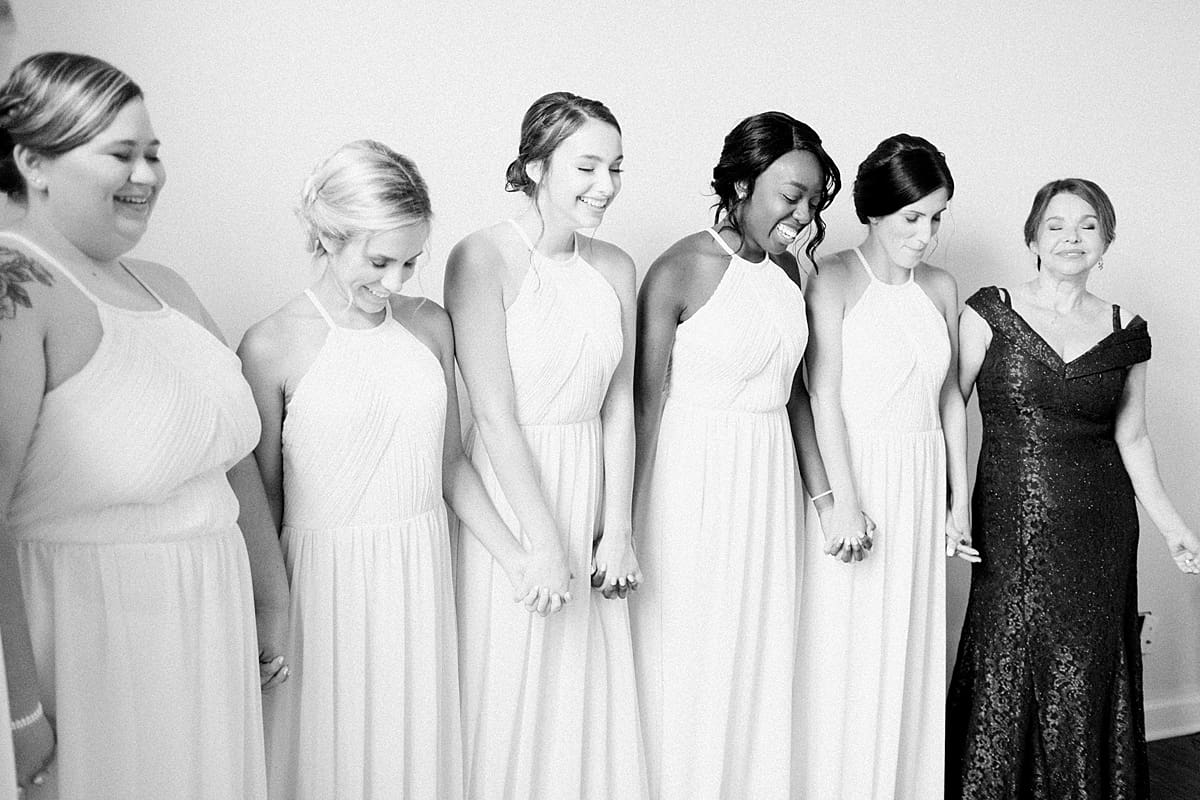 Arielle Peters Photography | Bride and bridesmaids having first reveal on wedding day at Newlife Community Church in Chicago, Illinois.