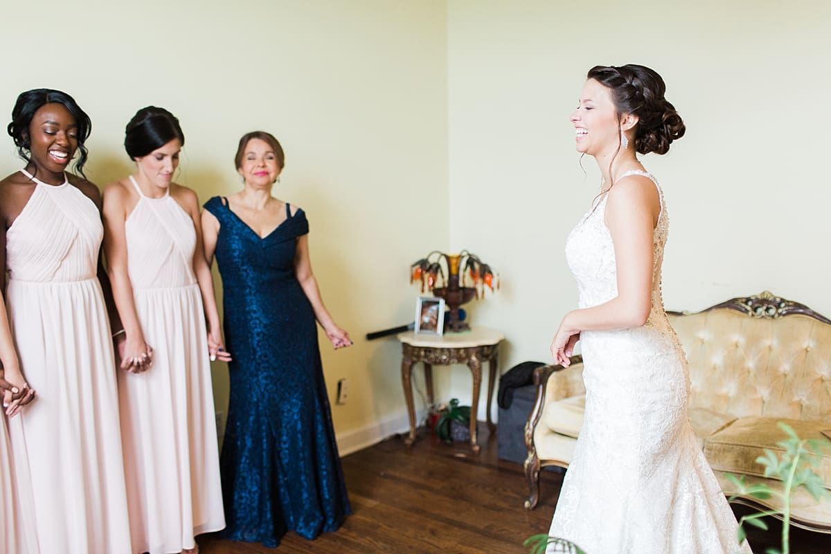 Arielle Peters Photography | Bride and bridesmaids having first reveal on wedding day at Newlife Community Church in Chicago, Illinois.