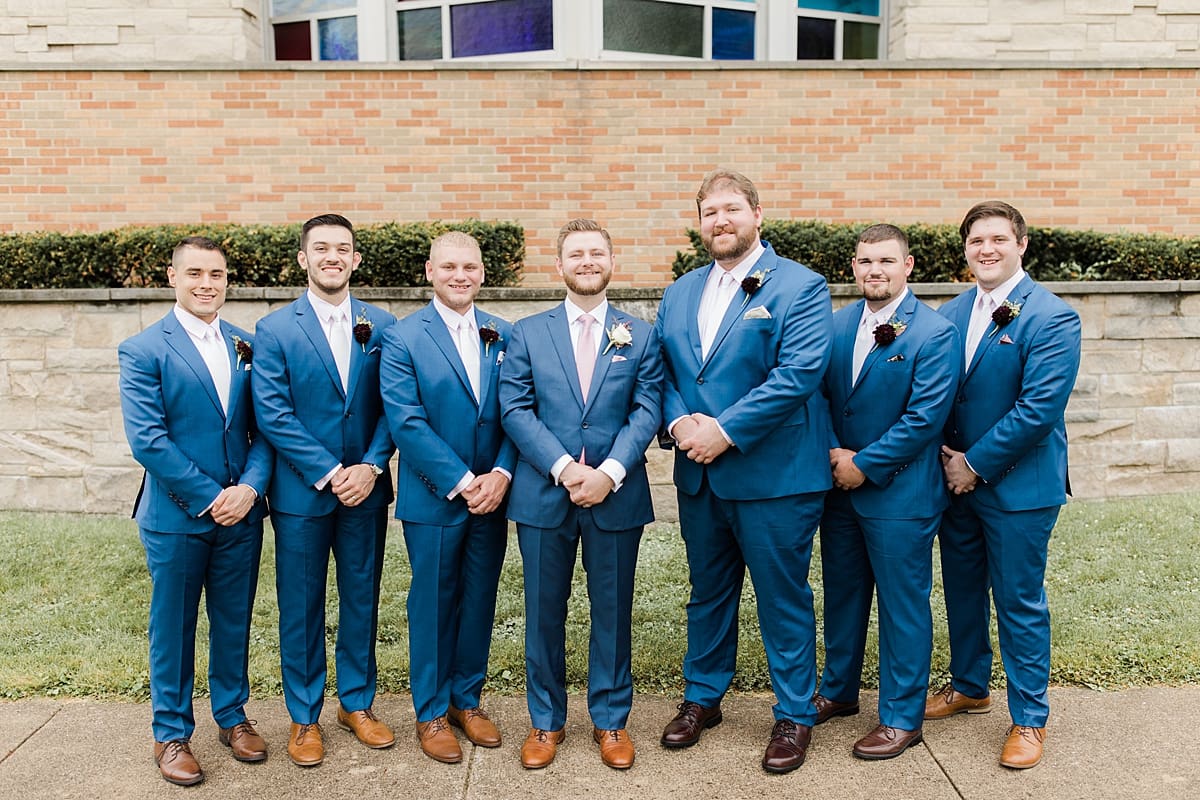 Arielle Peters Photography | Groom and groomsmen in tuxes on wedding day at Newlife Community Church in Chicago, Illinois.