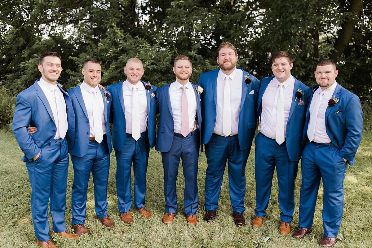 Arielle Peters Photography | Groom and groomsmen in tuxes on wedding day at Newlife Community Church in Chicago, Illinois.