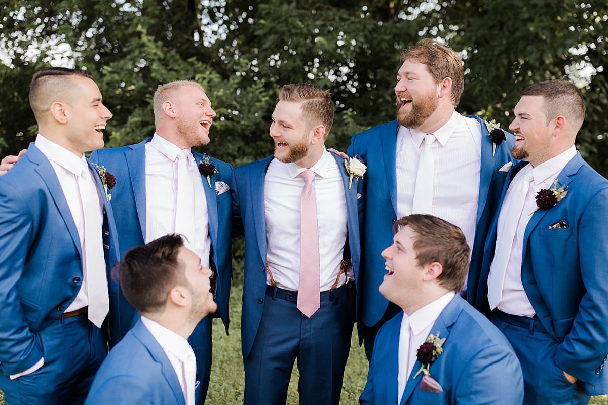 Arielle Peters Photography | Groom and groomsmen in tuxes on wedding day at Newlife Community Church in Chicago, Illinois.