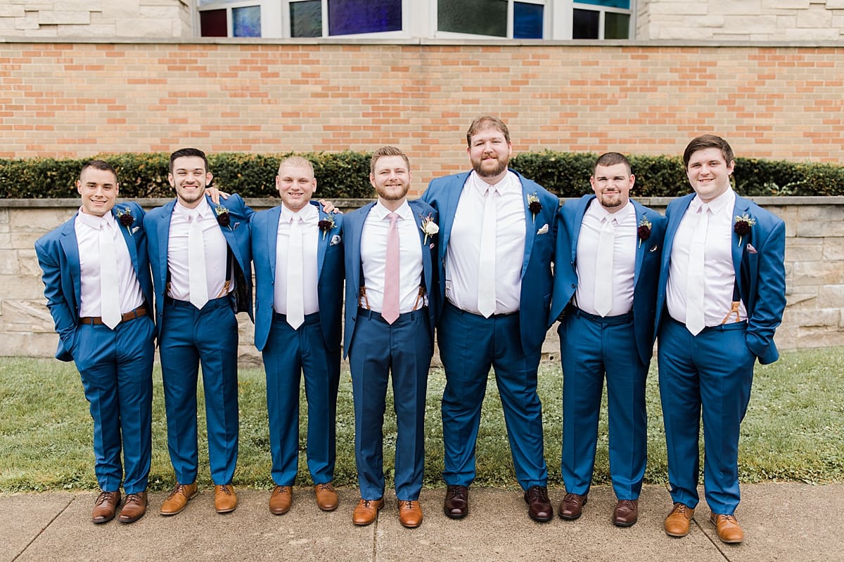 Arielle Peters Photography | Groom and groomsmen in tuxes on wedding day at Newlife Community Church in Chicago, Illinois.