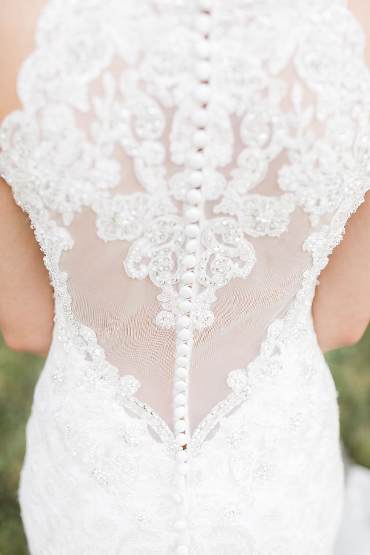 Arielle Peters Photography | Close up of bride's wedding gown back details on wedding day at Newlife Community Church in Chicago, Illinois.