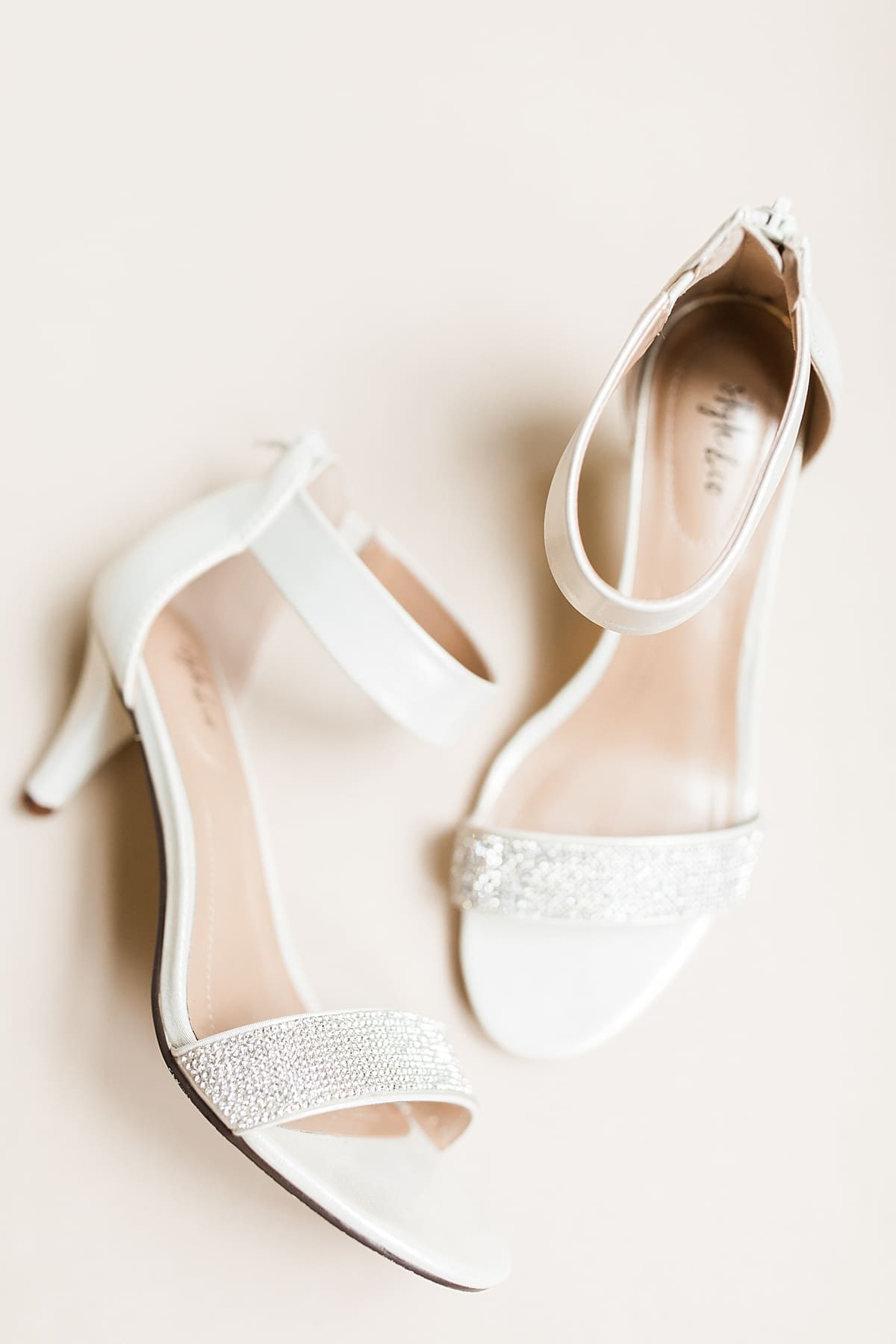 Arielle Peters Photography | Bride's wedding shoes on wedding day at Newlife Community Church in Chicago, Illinois.