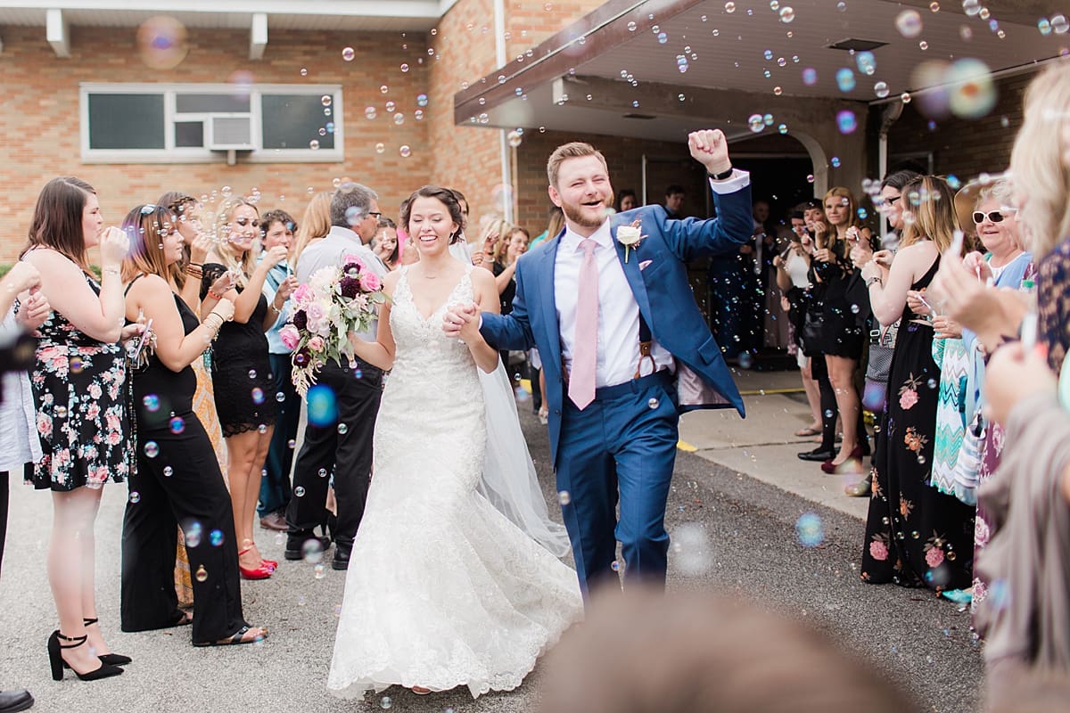 Arielle Peters Photography | Bride and groom leaving church on wedding day at Newlife Community Church in Chicago, Illinois.