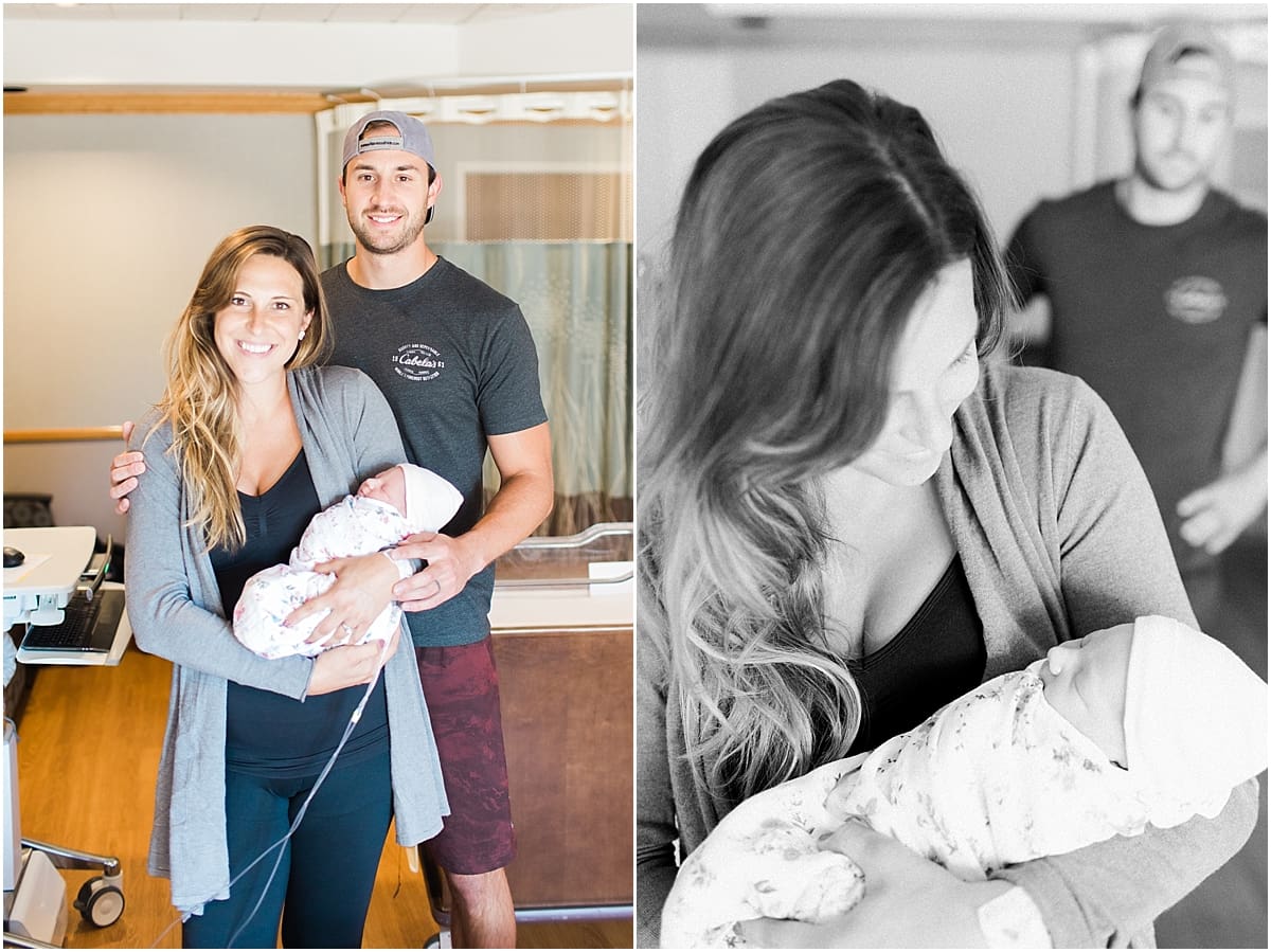 Arielle Peters Photography | Husband and wife holding their newborn baby. 