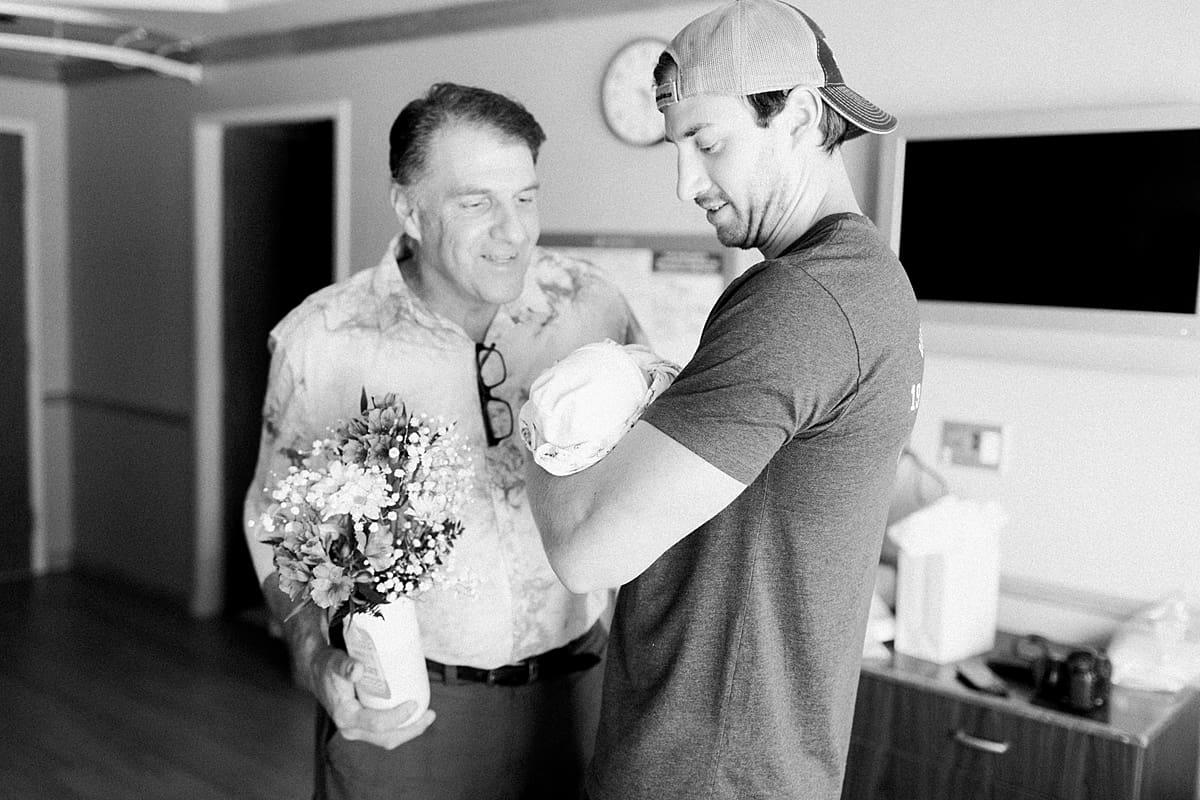 Arielle Peters Photography | Newborn baby girl meeting grandpa.