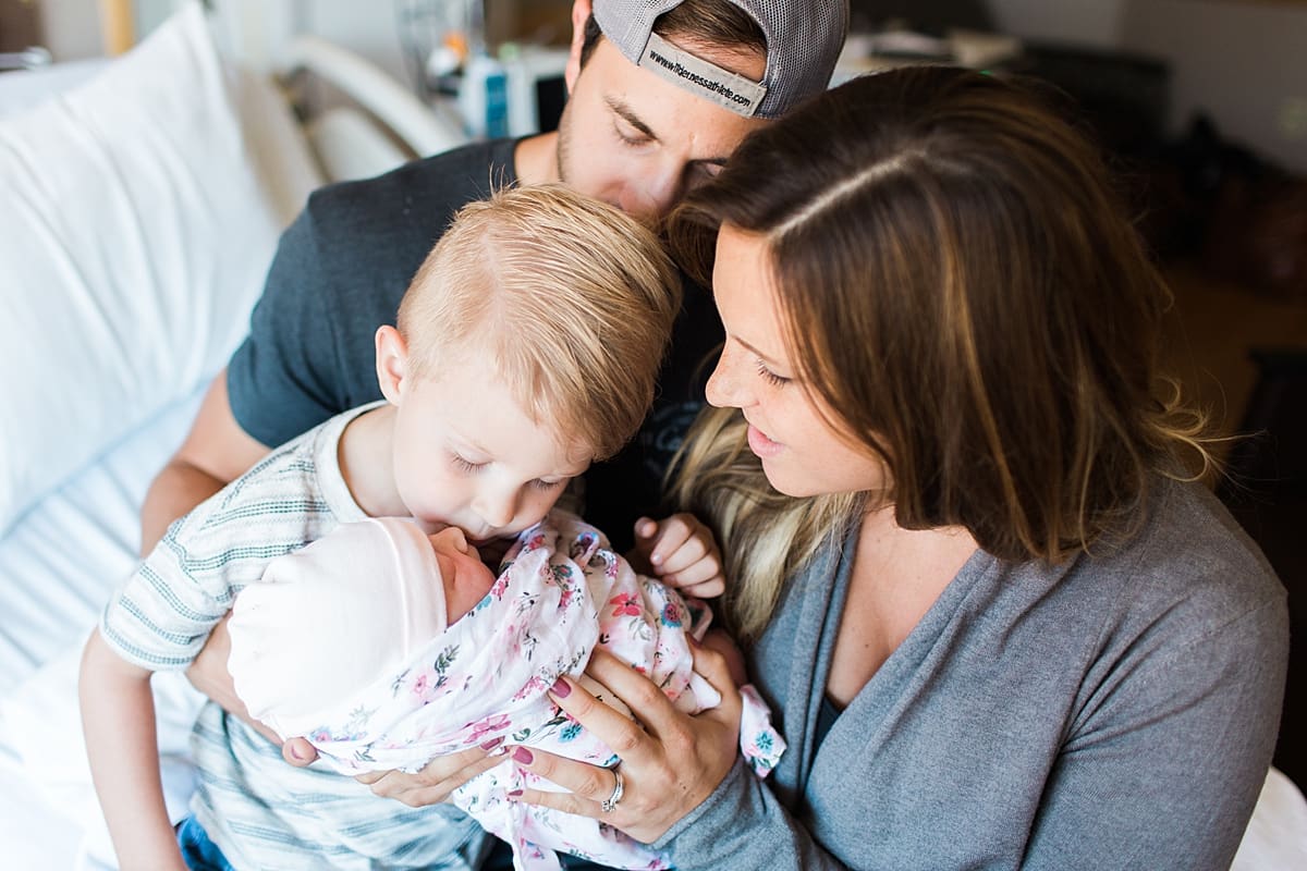 Arielle Peters Photography | Family bonding with their new born baby girl.