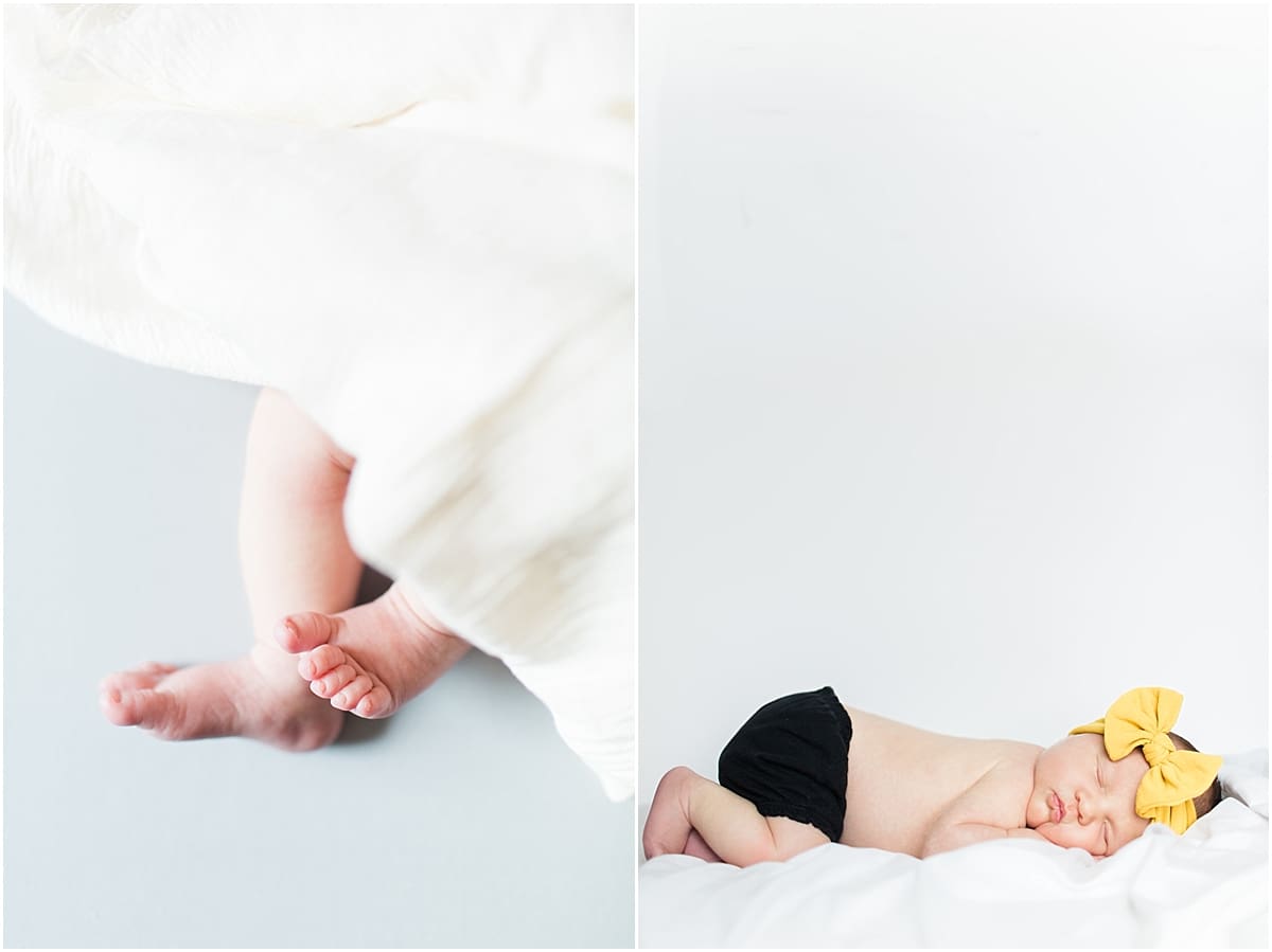 Arielle Peters Photography | Newborn baby girl wearing a bow in one month photos.