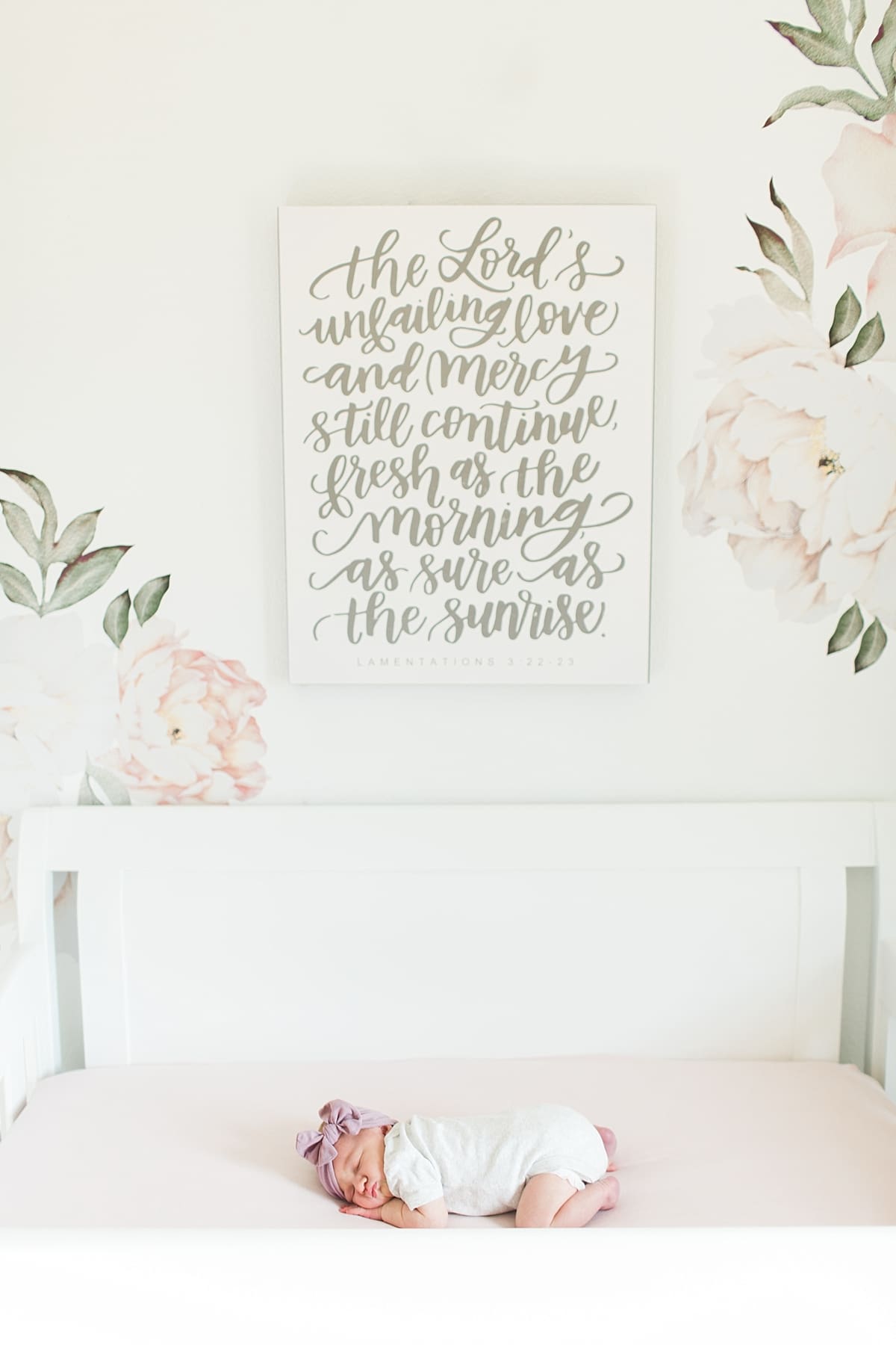 Arielle Peters Photography | Newborn baby sleeping under scripture painting.